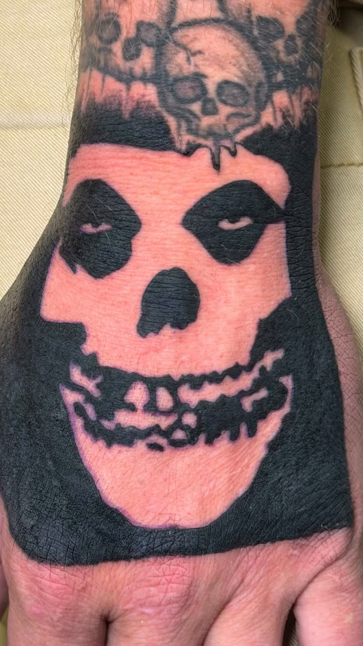 Misfits skull tattoo on hand dark art tattoo on the hand by Rafael Marte, White Plains, New York