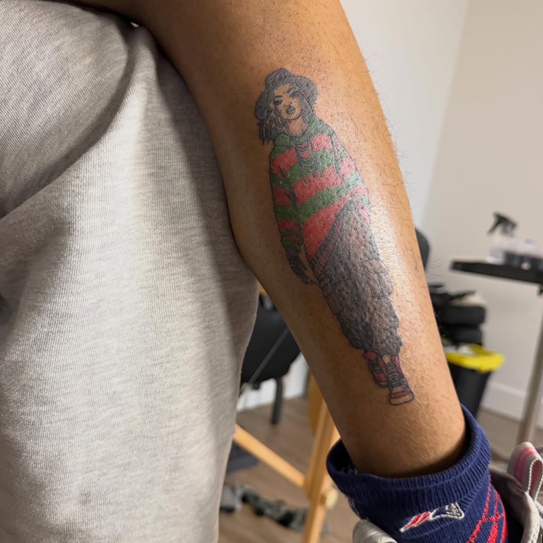 Freddy Krueger character neo-traditional tattoo on the forearm by Jay