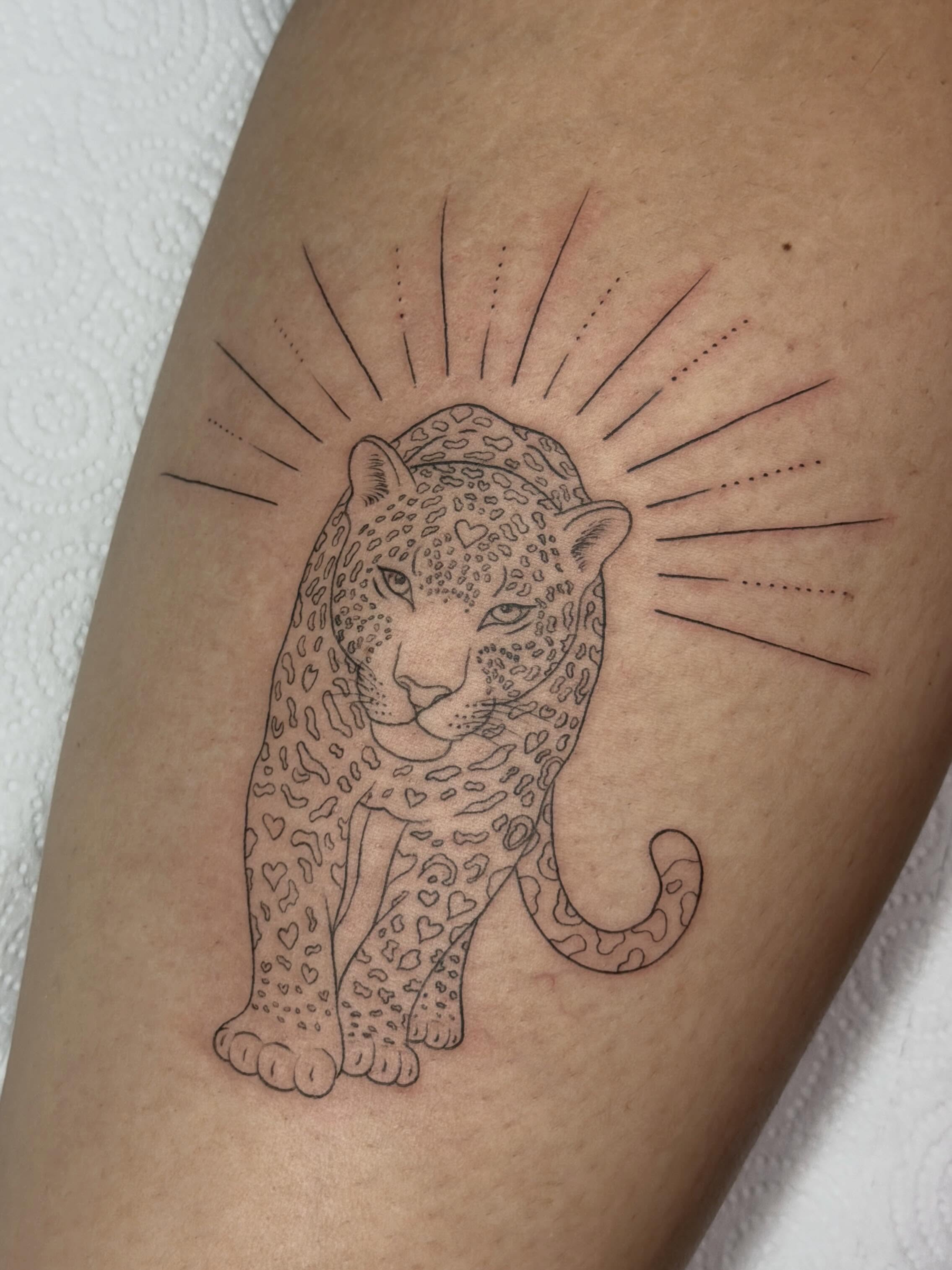 Jaguar dotwork tattoo on the thigh by Baka Ink