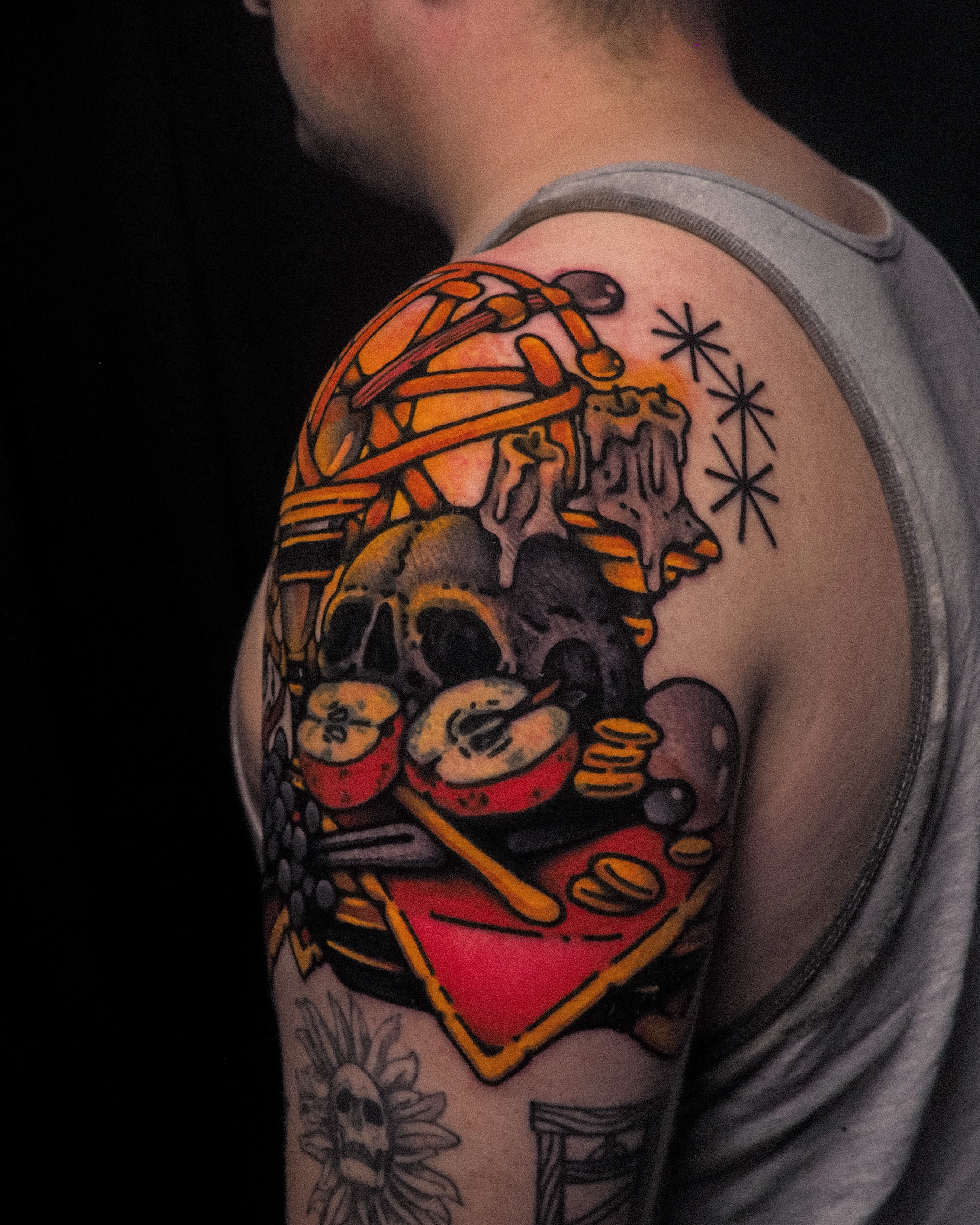 Skull and musical instruments American traditional tattoo on the shoulder by Last Year Of Disaster