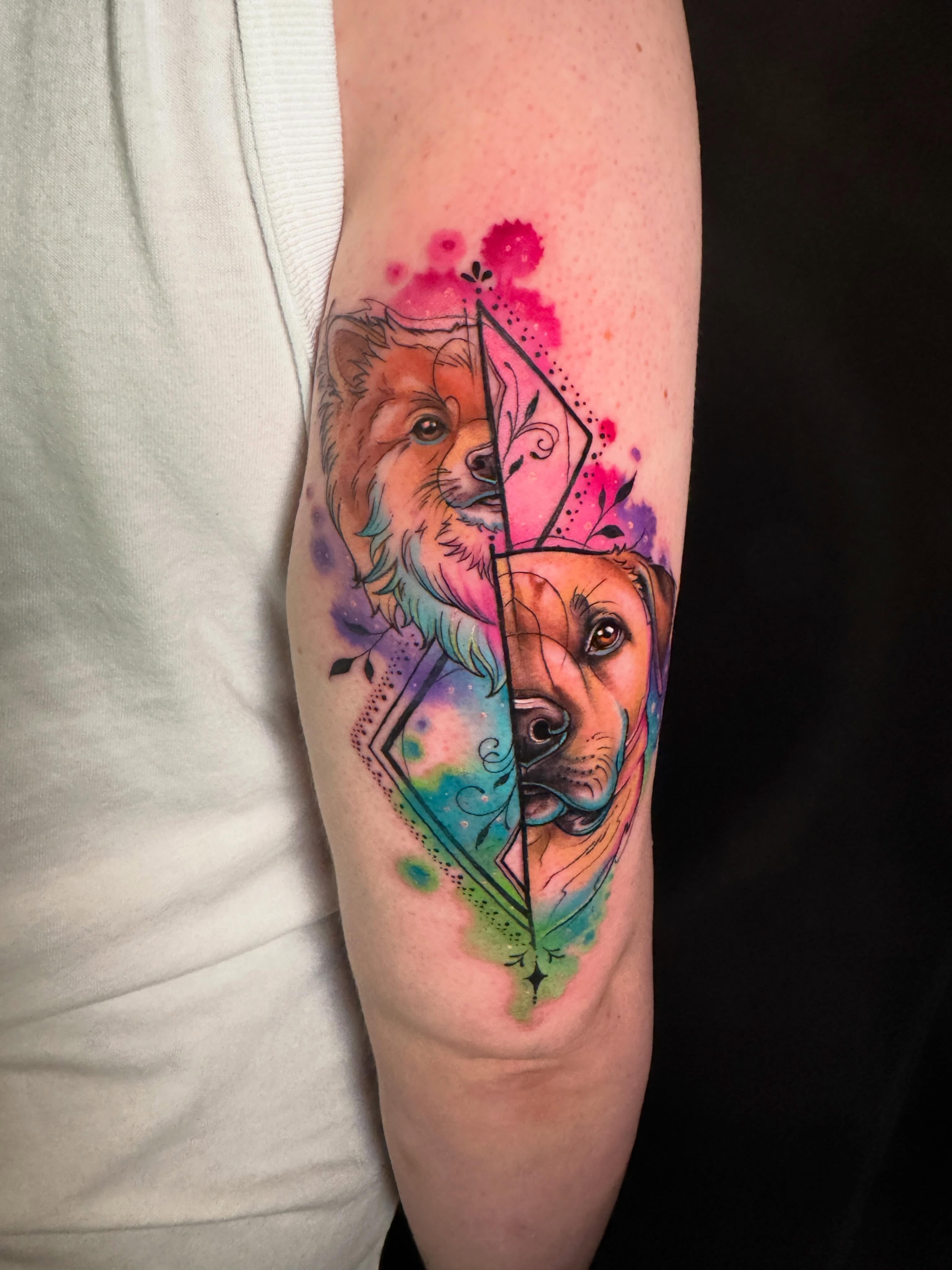Dogs watercolor tattoo on the forearm by Violet Michelle Williams, Charlotte, North Carolina