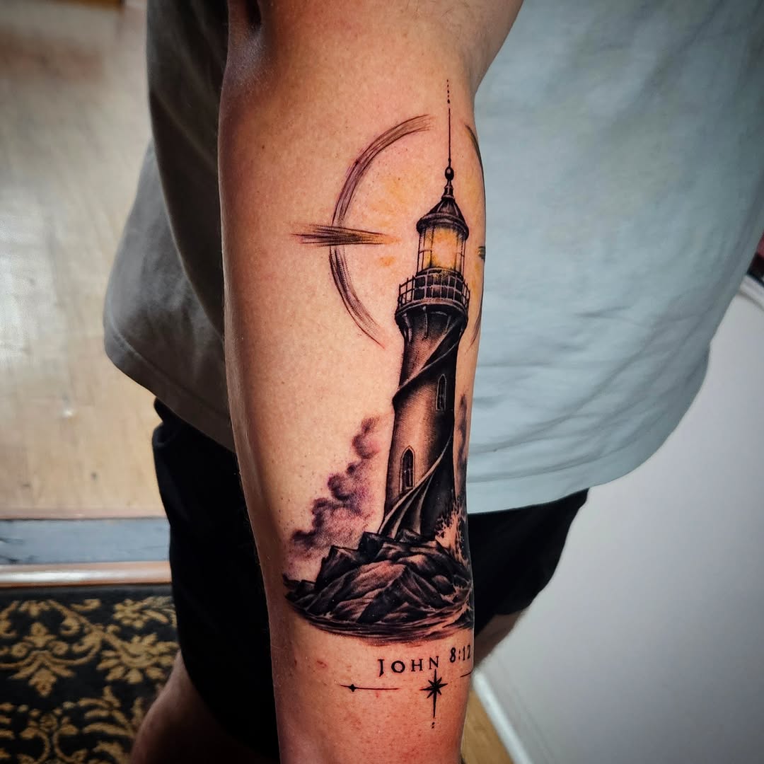 Lighthouse realism tattoo on the forearm by Isaac Morales