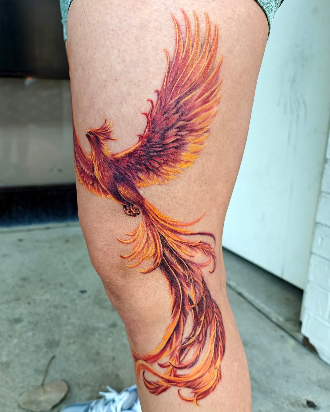 Phoenix realism tattoo on the thigh by Dallas Tattoo Artist Erik Espinoza
