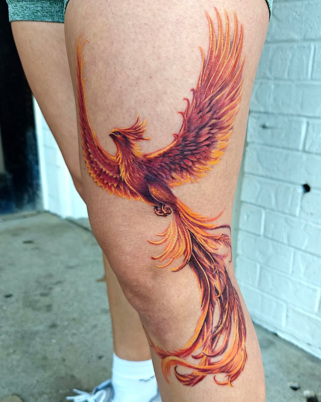 Phoenix realism tattoo on the thigh by Dallas Tattoo Artist Erik Espinoza