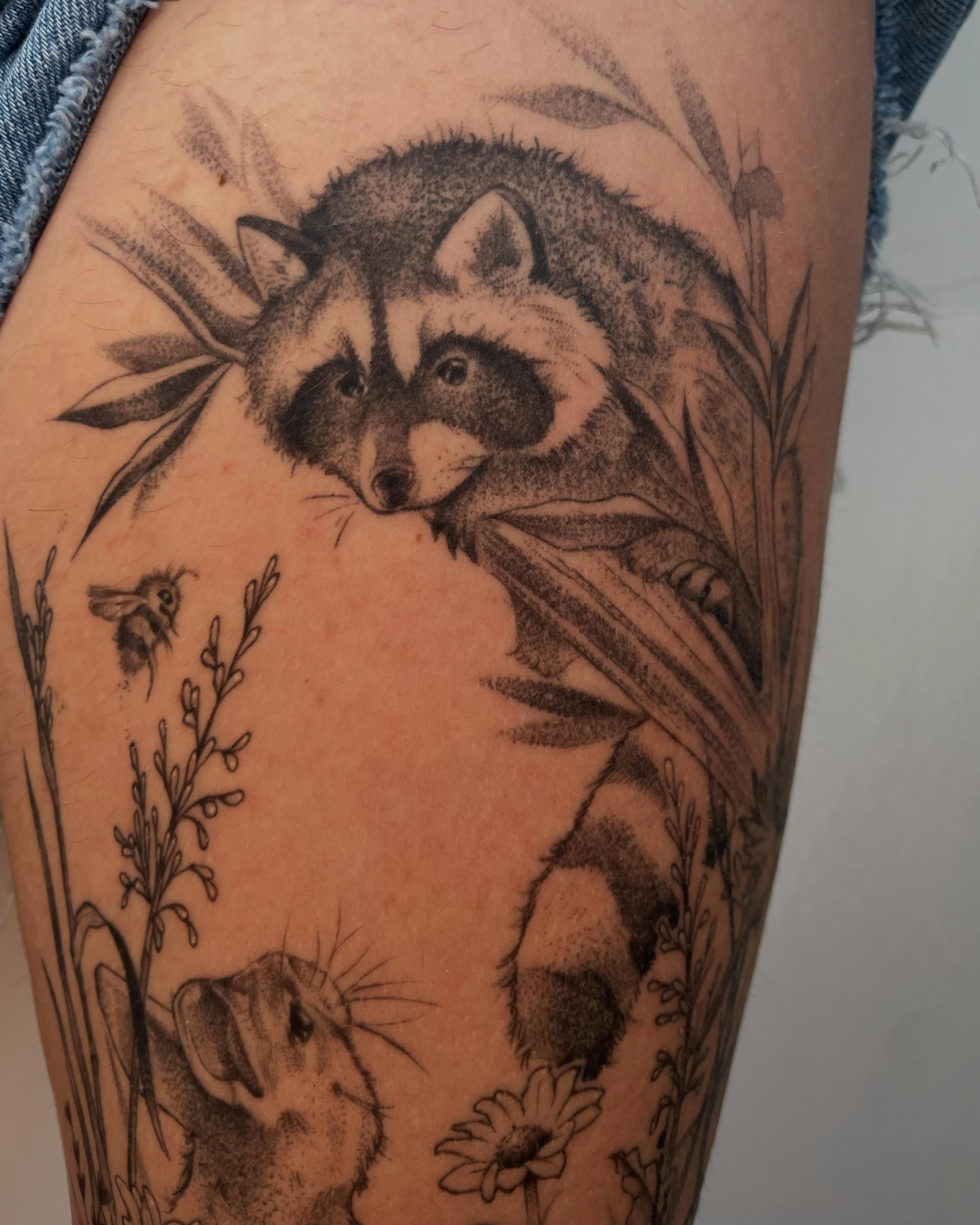 Raccoon and mouse realism tattoo on the thigh by Sam chase, Naperville, Illinois