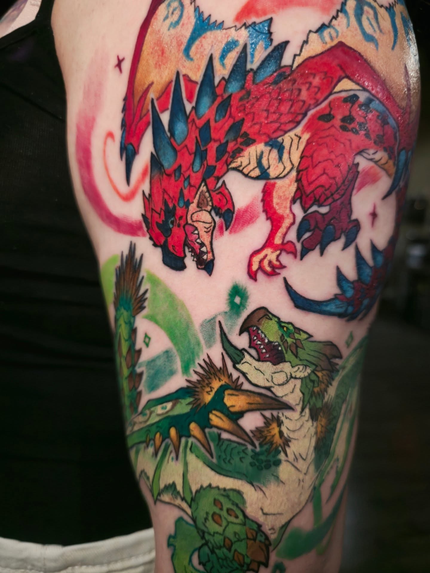 Dragons dotwork tattoo on the forearm by Tucker