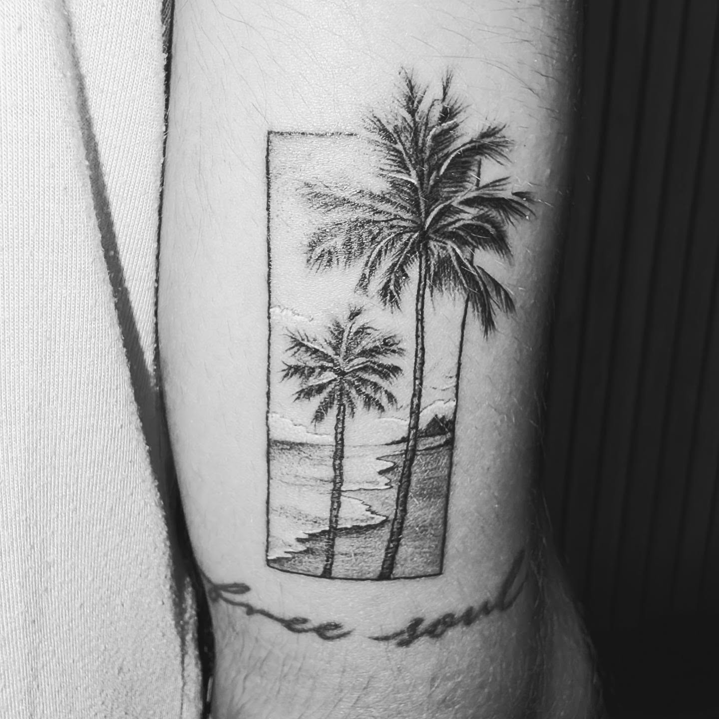 Palm trees black and grey tattoo on the forearm by Tony