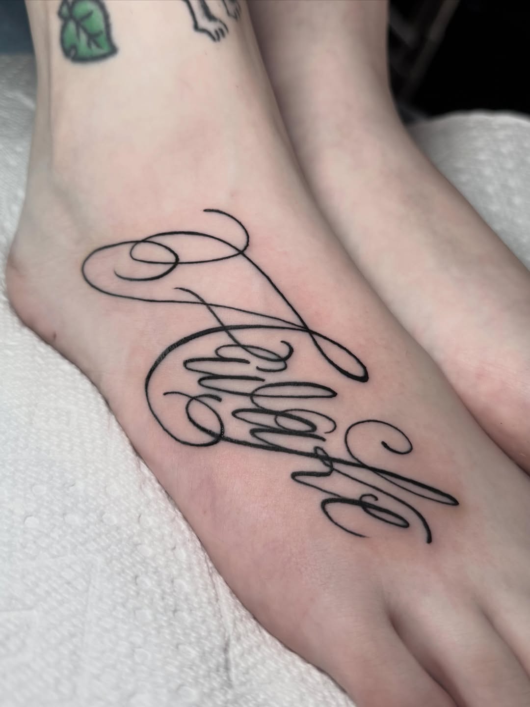 Tattoo by @painted_peach — lettering_script, fine_line