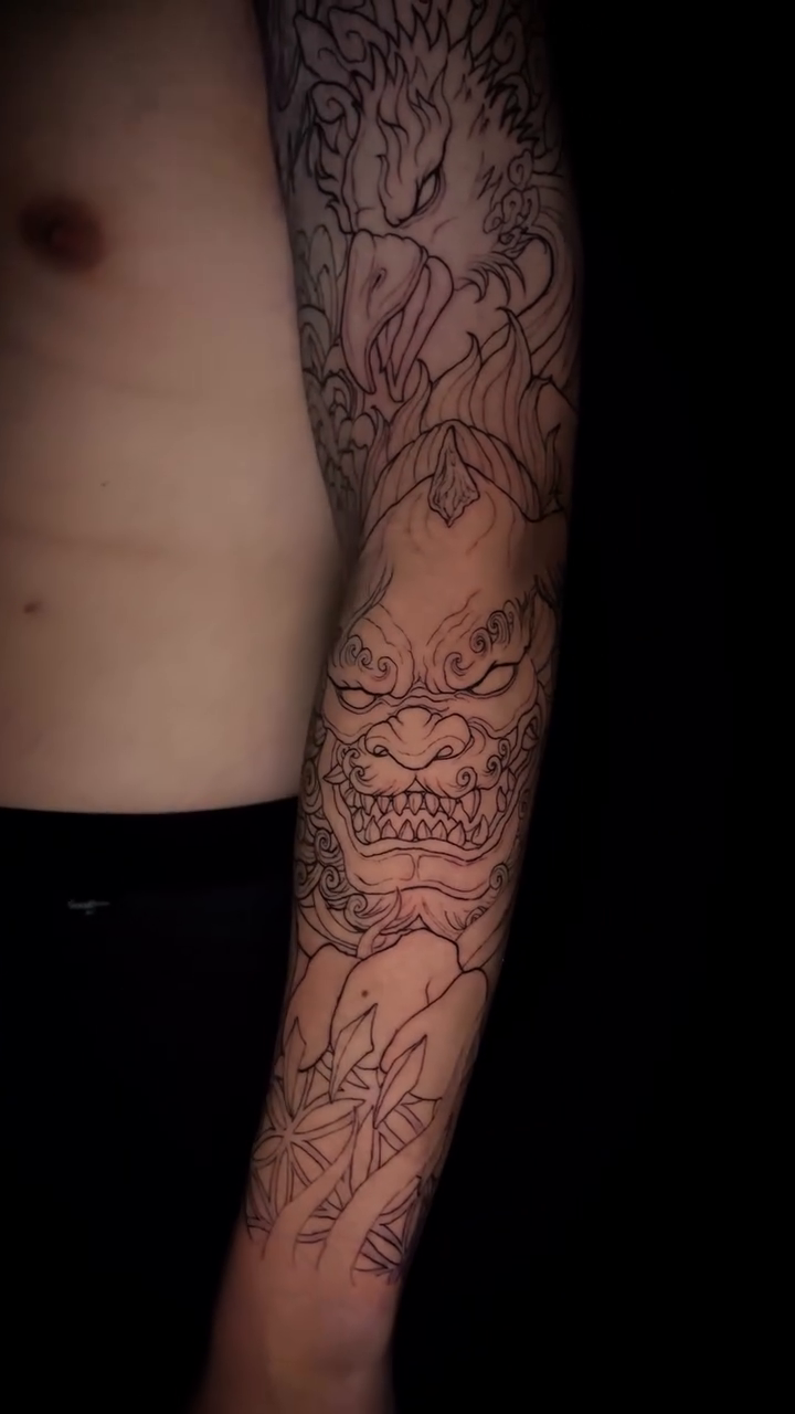 Dragon and chrysanthemum sleeve Japanese tattoo on the upper arm by bev