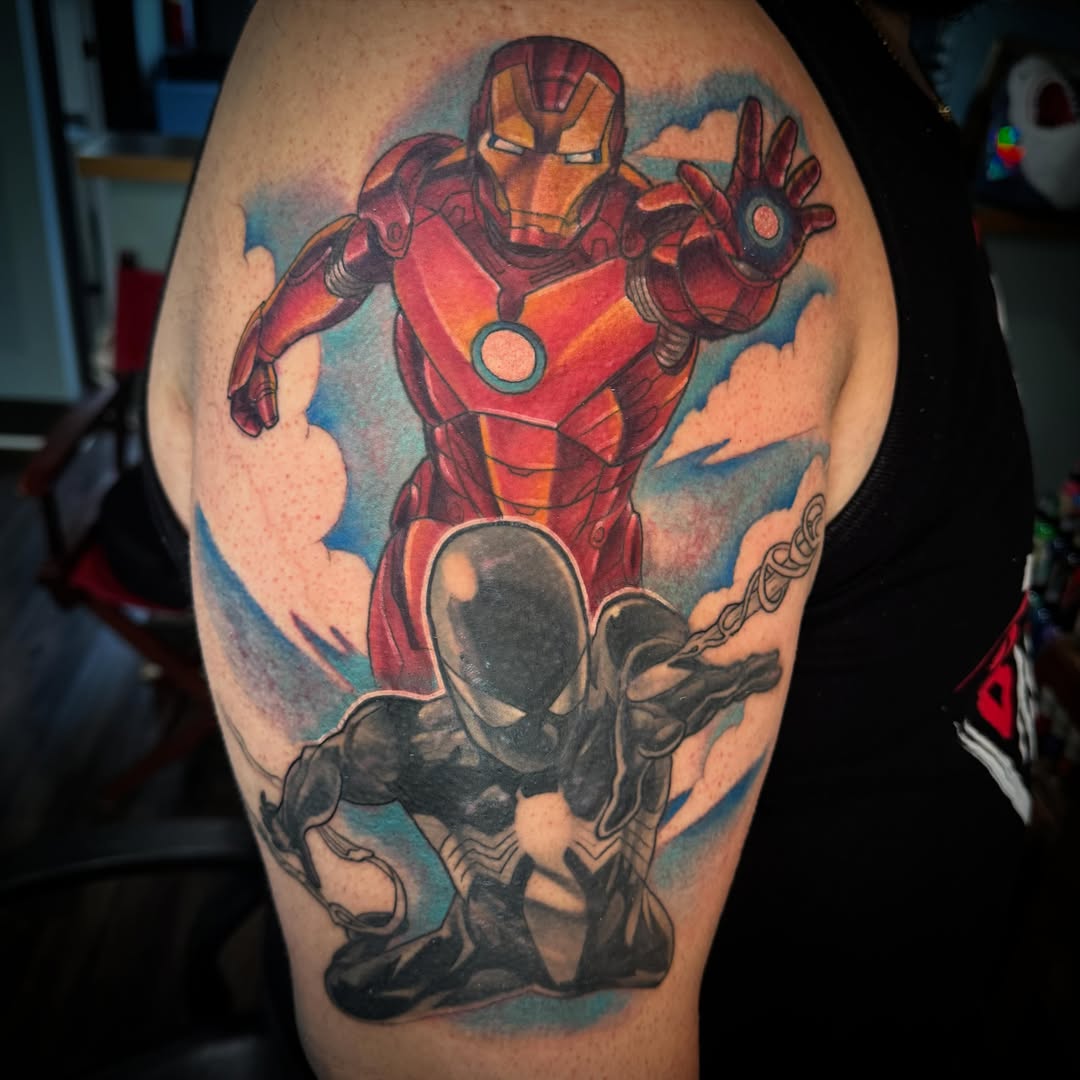 Iron Man and Spider-Man realism tattoo on the upper arm by Cory Haberman