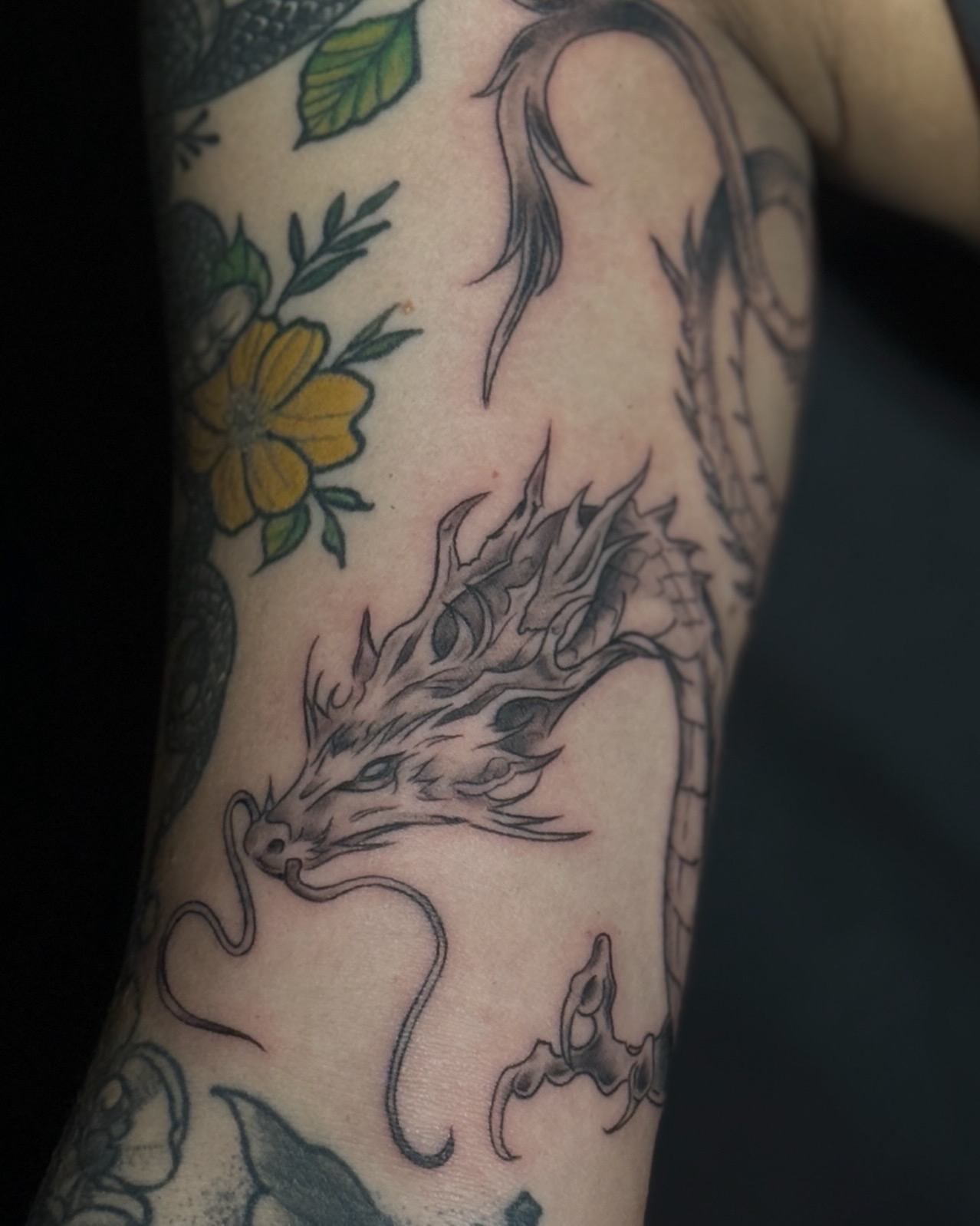 Dragon black and grey tattoo on the forearm by 「 ✦ Sa-Na ✦ 」DMV TATTOO ARTIST