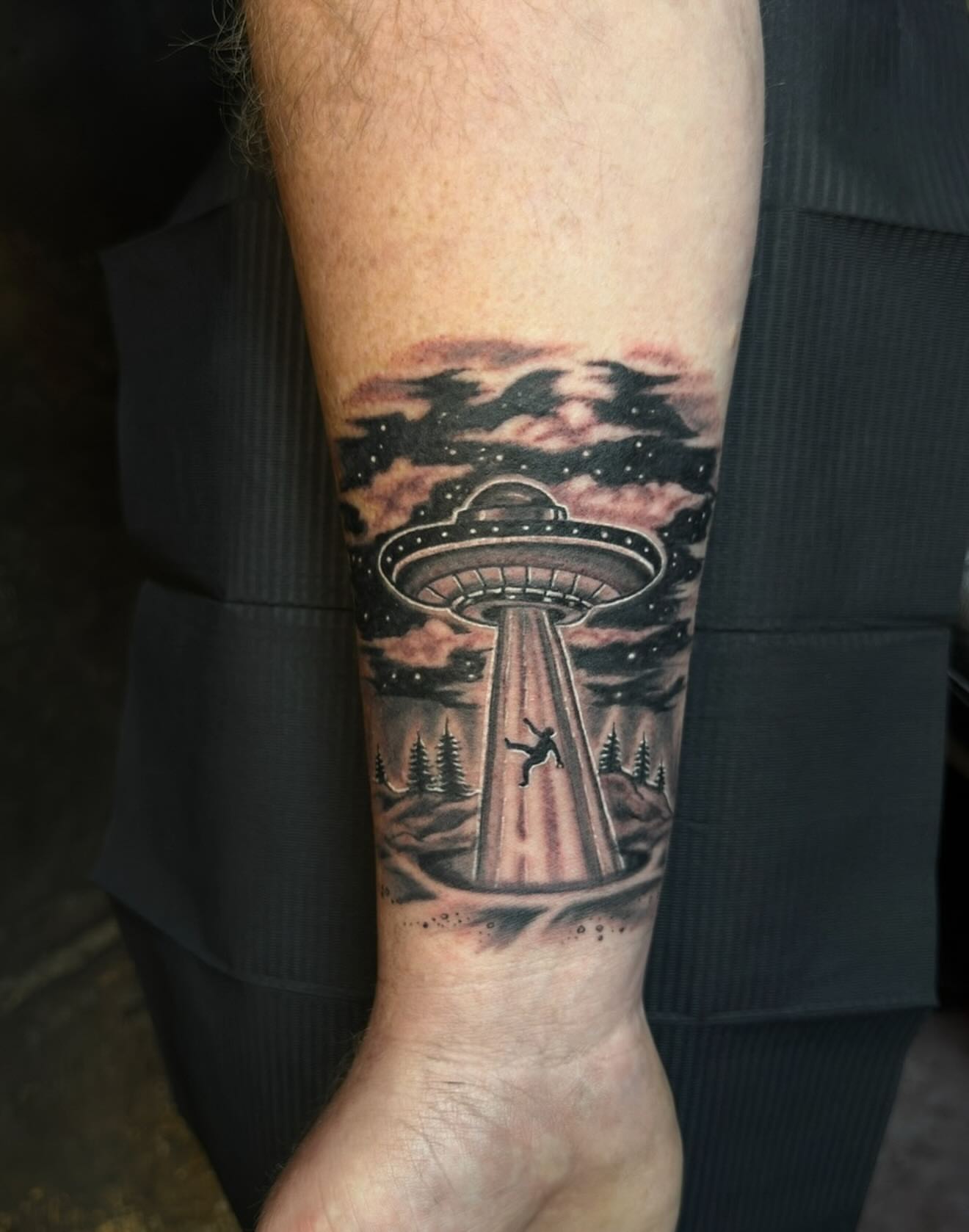 Alien abduction realism tattoo on the forearm by Gary Chase
