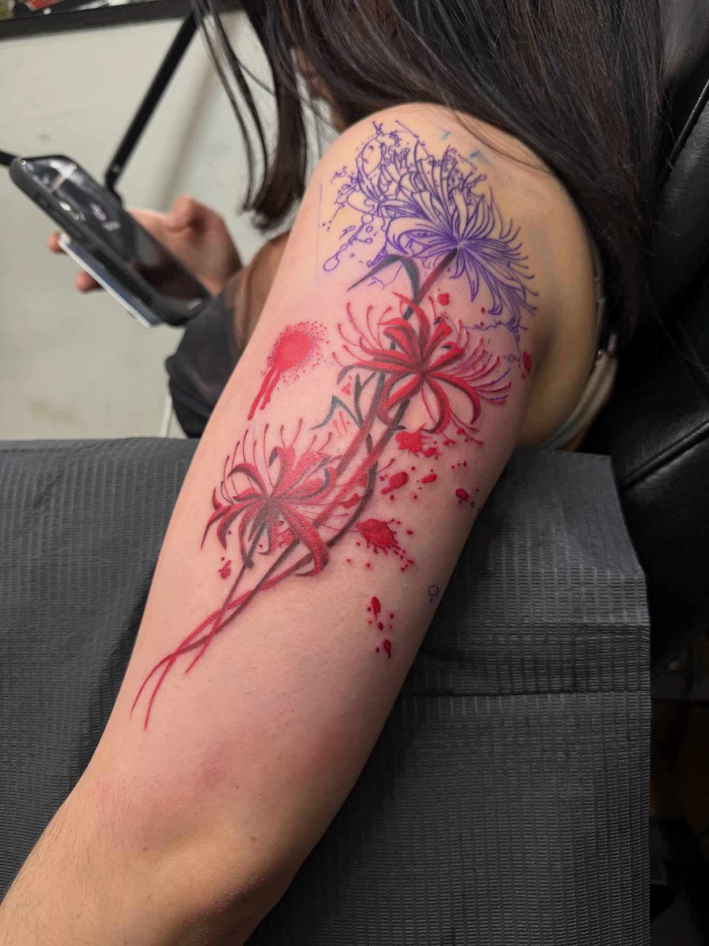 Chrysanthemums dotwork tattoo on the forearm by Eduardo Chaparro