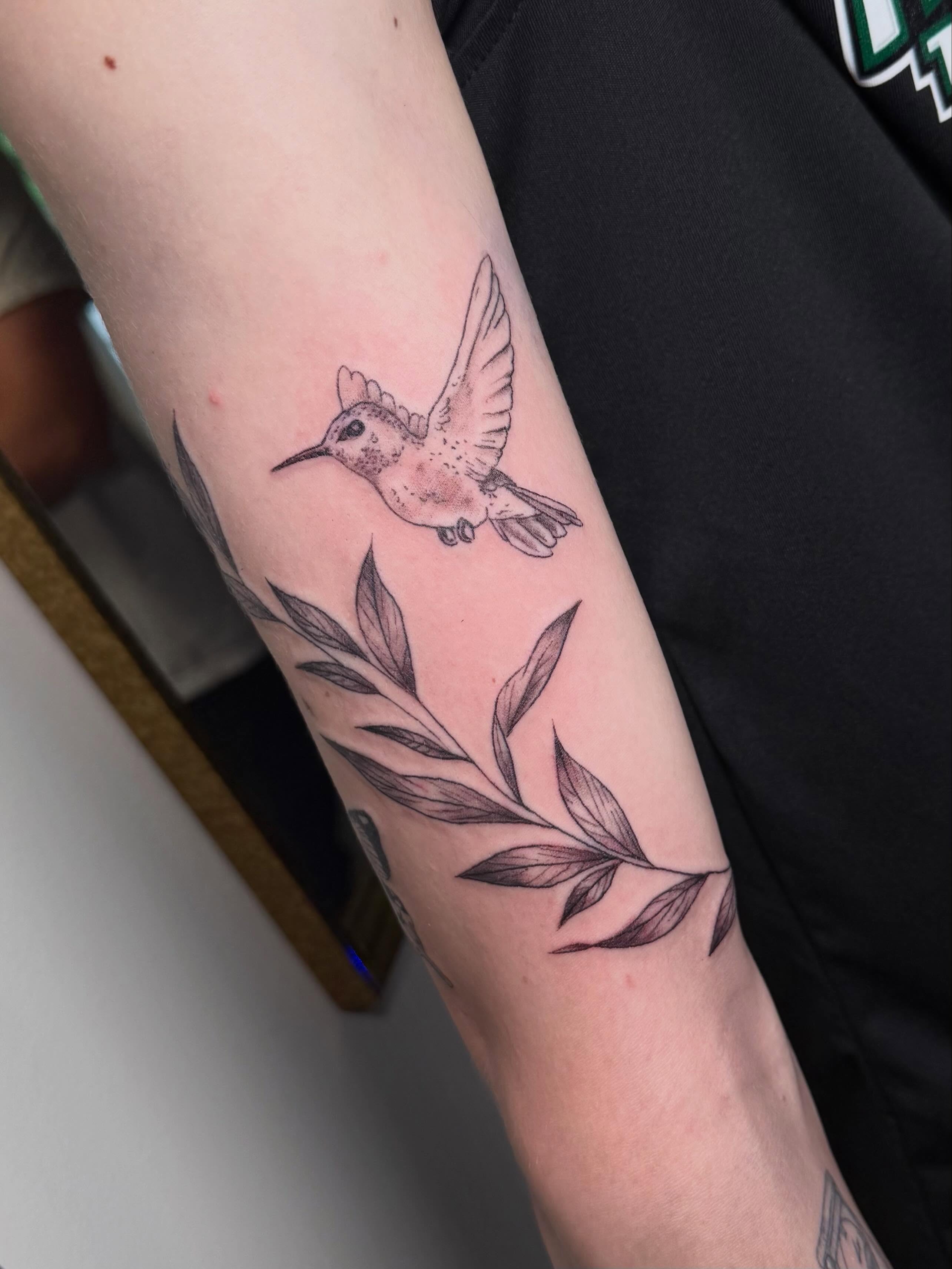 Hummingbird black and grey tattoo on the forearm by βπ¬π―π’πΆ