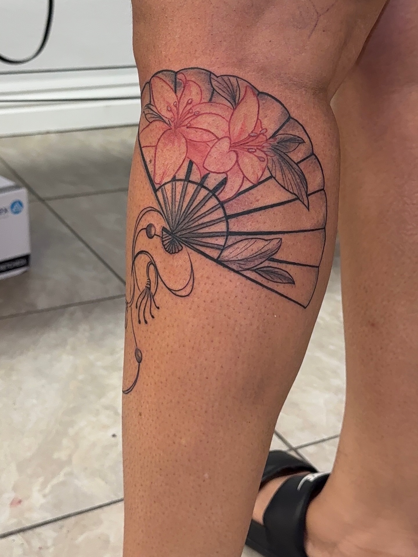 Fan and flowers dotwork tattoo on the forearm by XoticTherapy, Las Vegas, Nevada