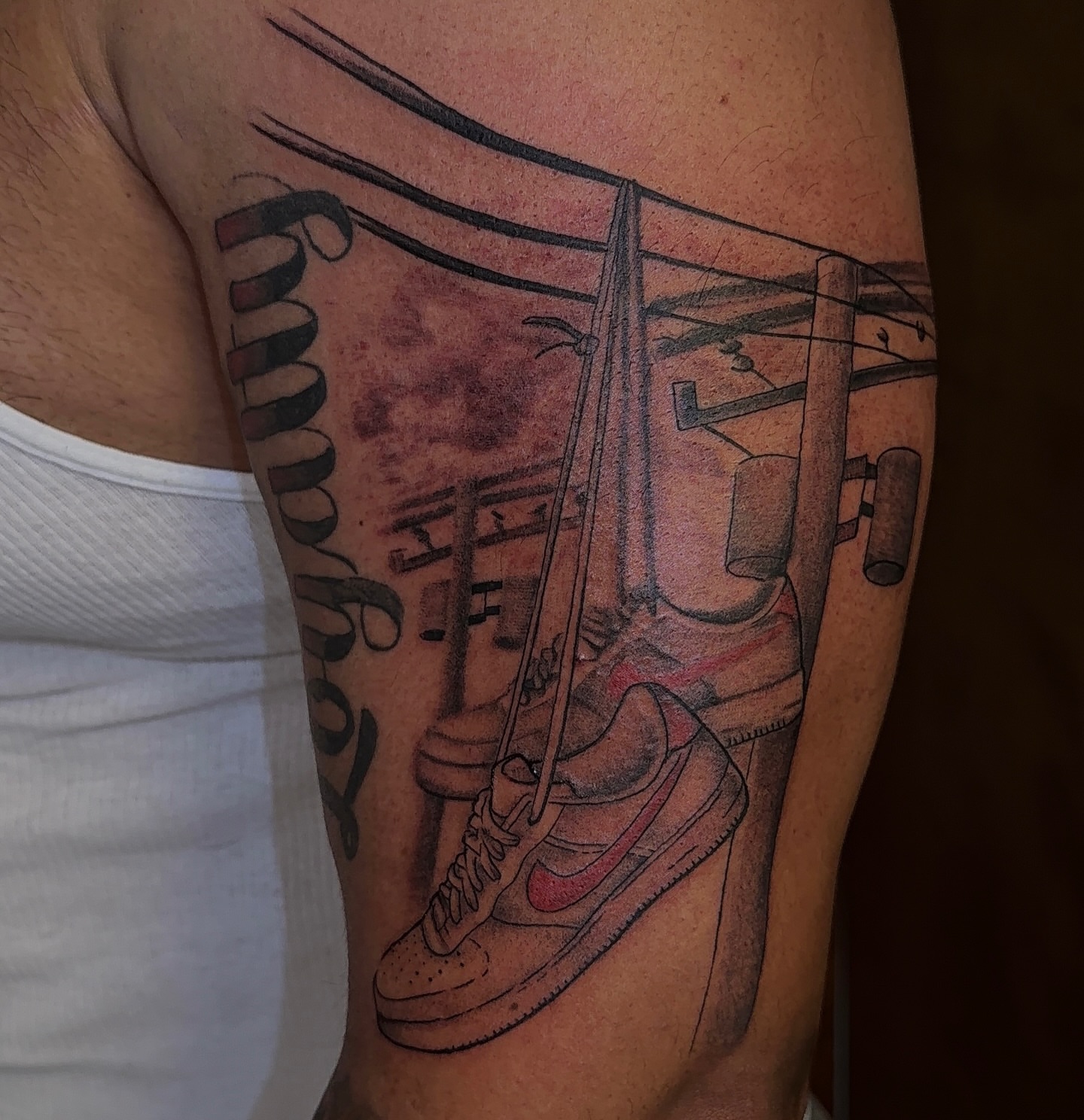 Sneakers and gym equipment realism tattoo on the thigh by XoticTherapy, Las Vegas, Nevada