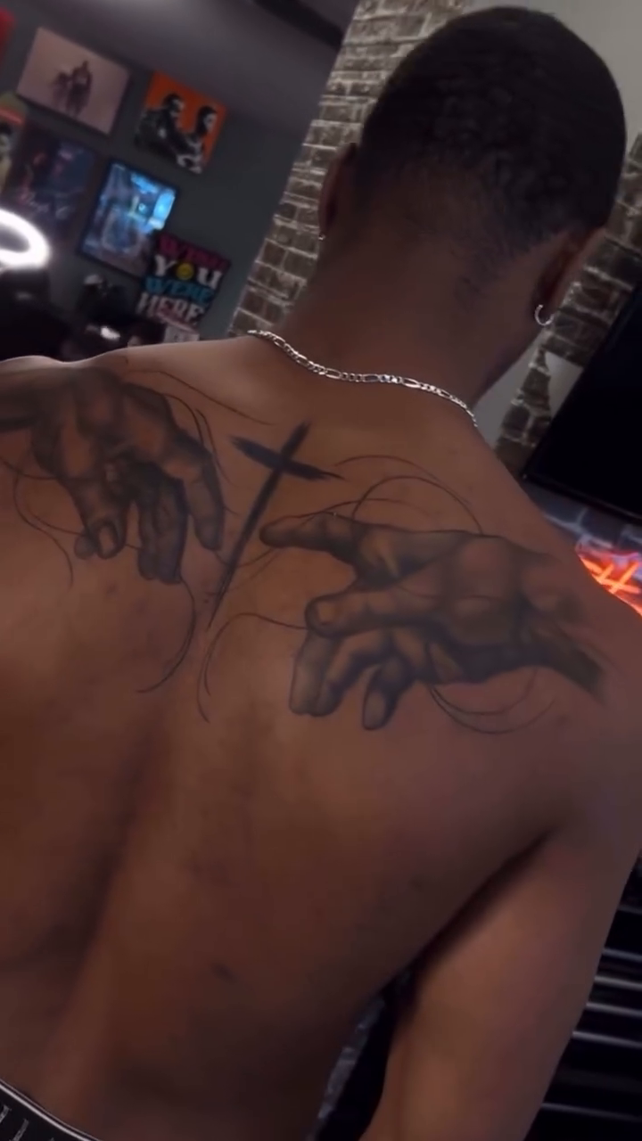 Blackwork tattoo on the back by Terrence jones