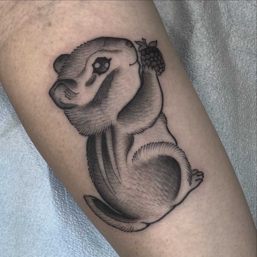 Chipmunk with berry realism tattoo on the forearm by Amelia Rose, Los Angeles, California