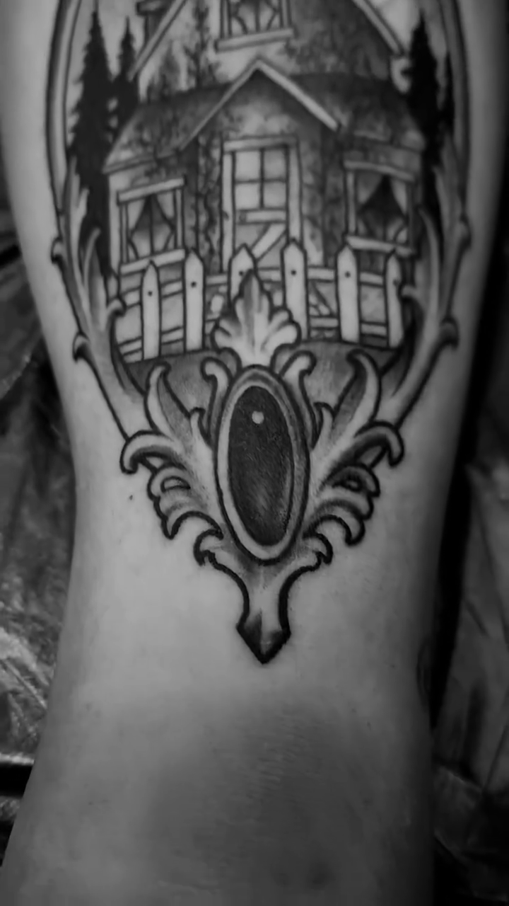 Tattoo by @fridaytattooer — dark_realism, black_and_grey