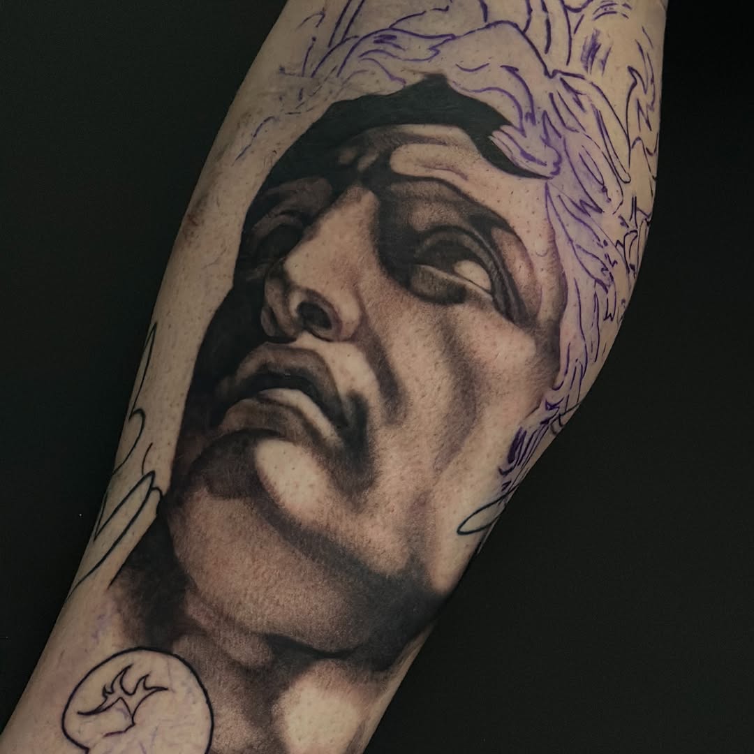 Sculpture bust sketch tattoo on the forearm by Trent Hebert
