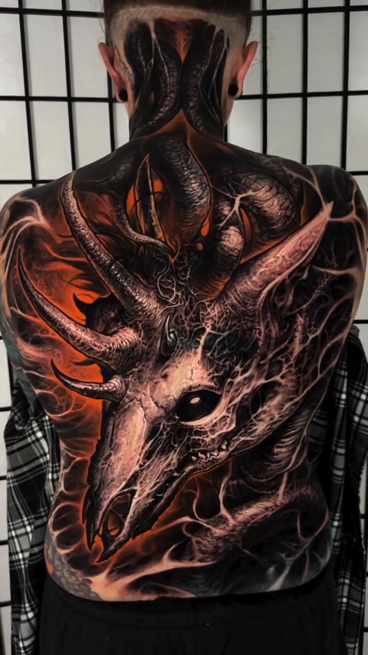 Demonic creature backpiece realism tattoo on the back by Brandon Herrera