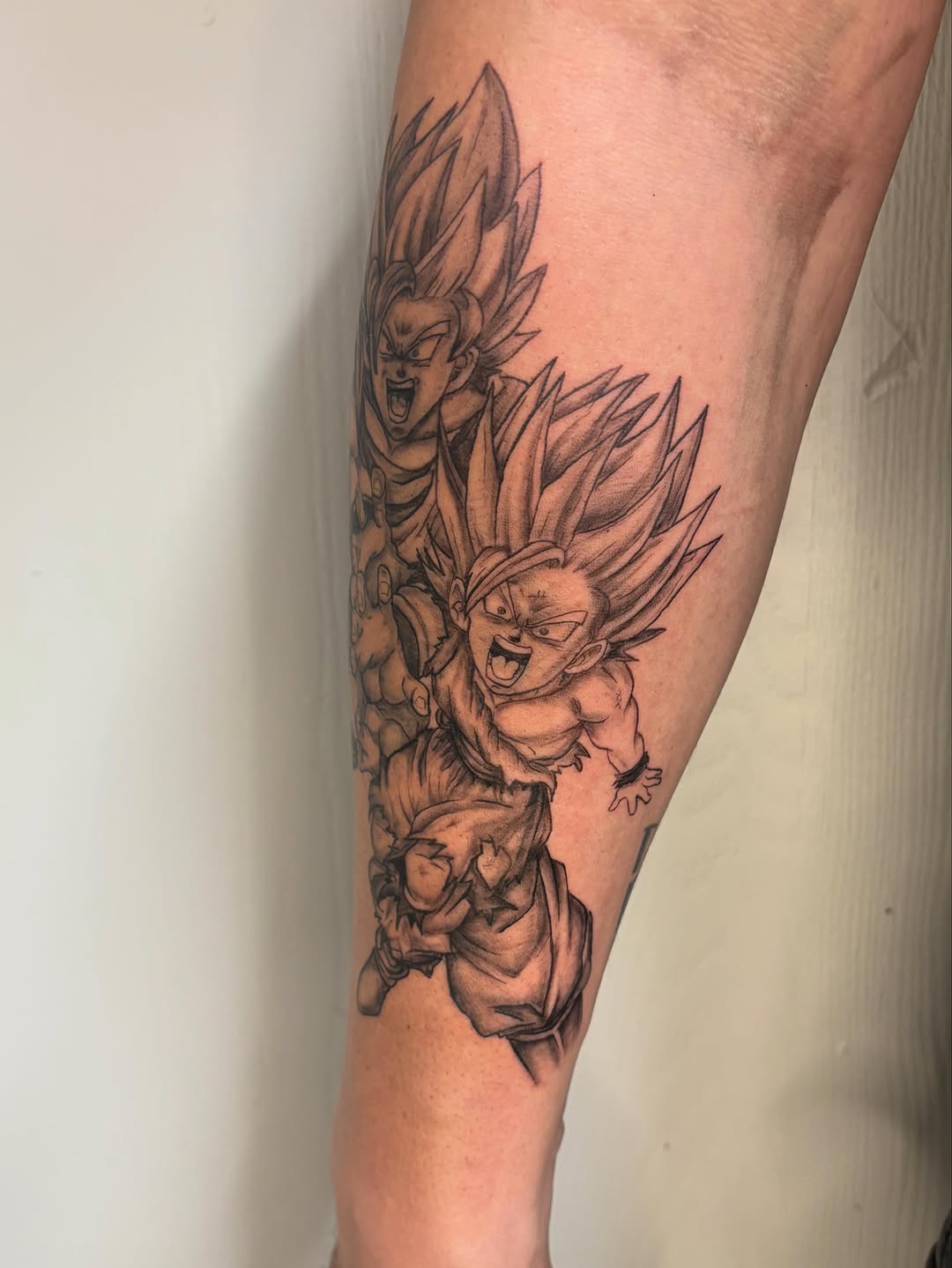 Tattoo by @jc_tat2s — anime, black_and_grey