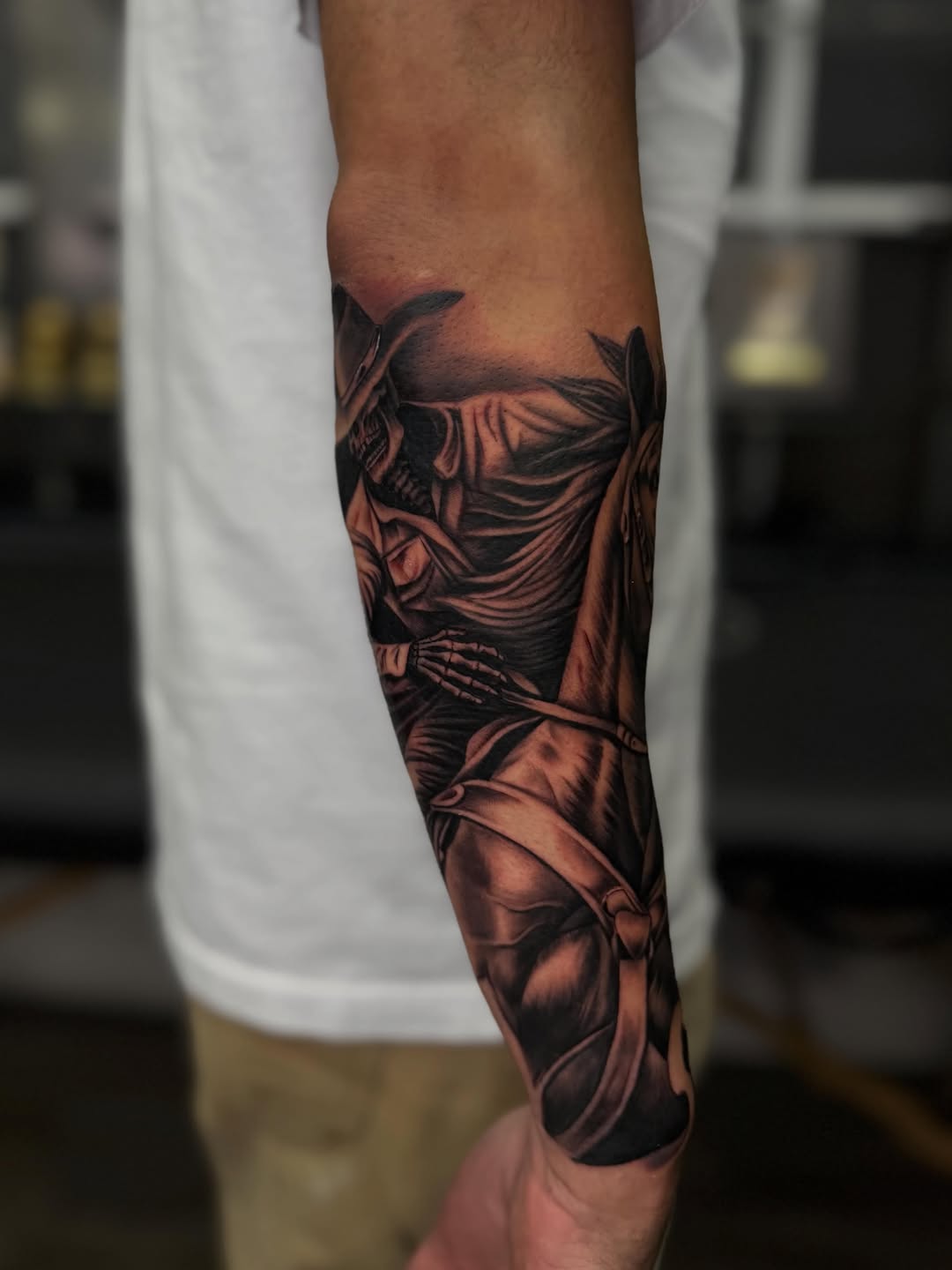Grim reaper on horseback realism tattoo on the forearm by LOS