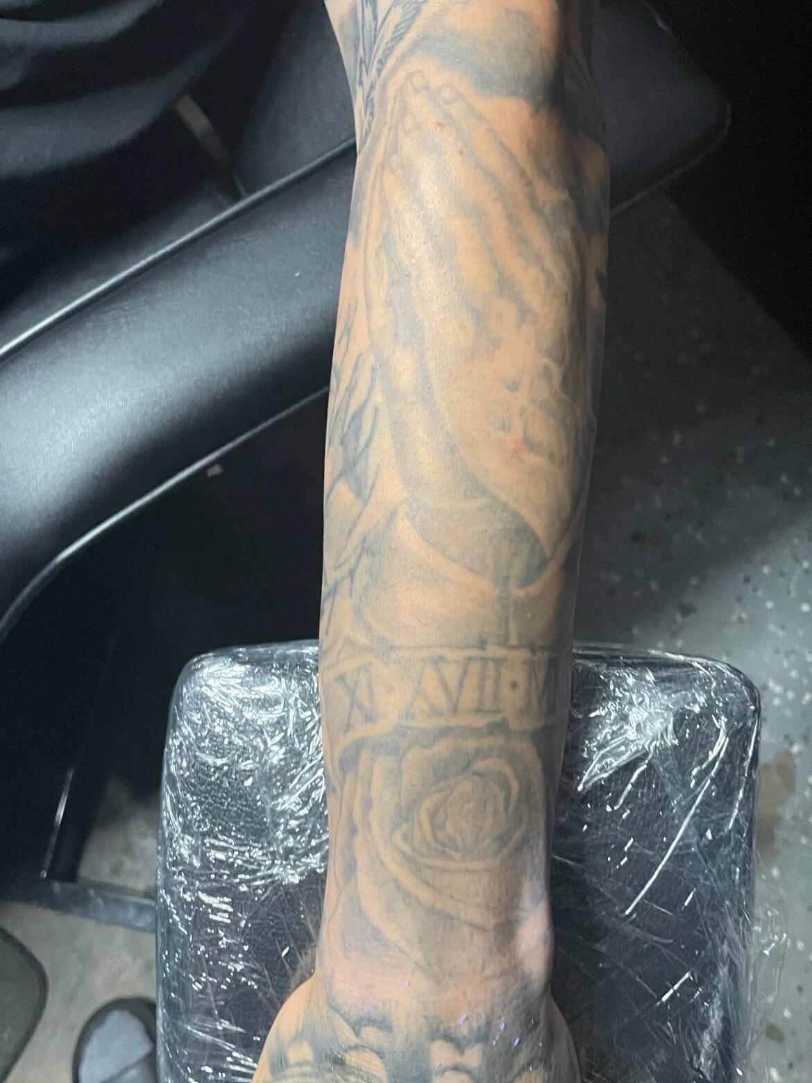 Praying hands black and grey tattoo on the forearm by TreCashTats💉🩸 MisfitzTattooStudio