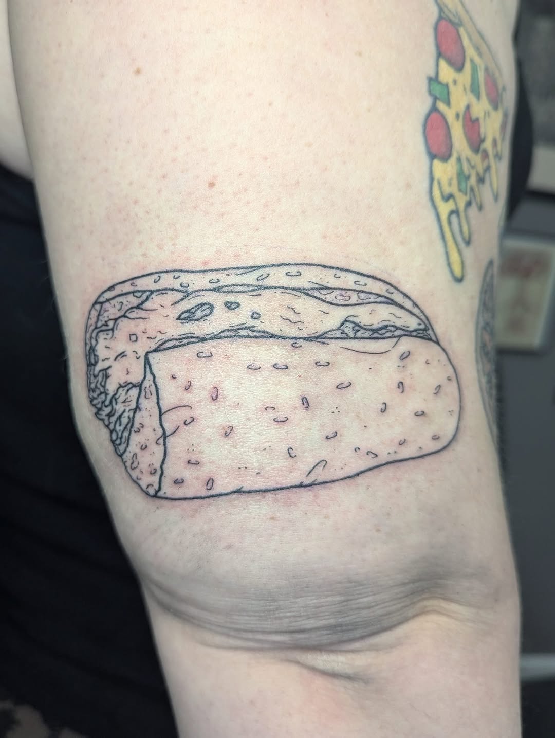Burrito tattoo on the forearm by Patricio