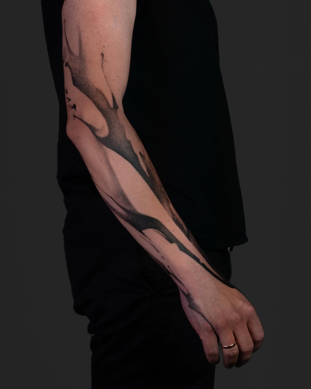 Abstract smoke sketch tattoo on the forearm by Pietro Moleti