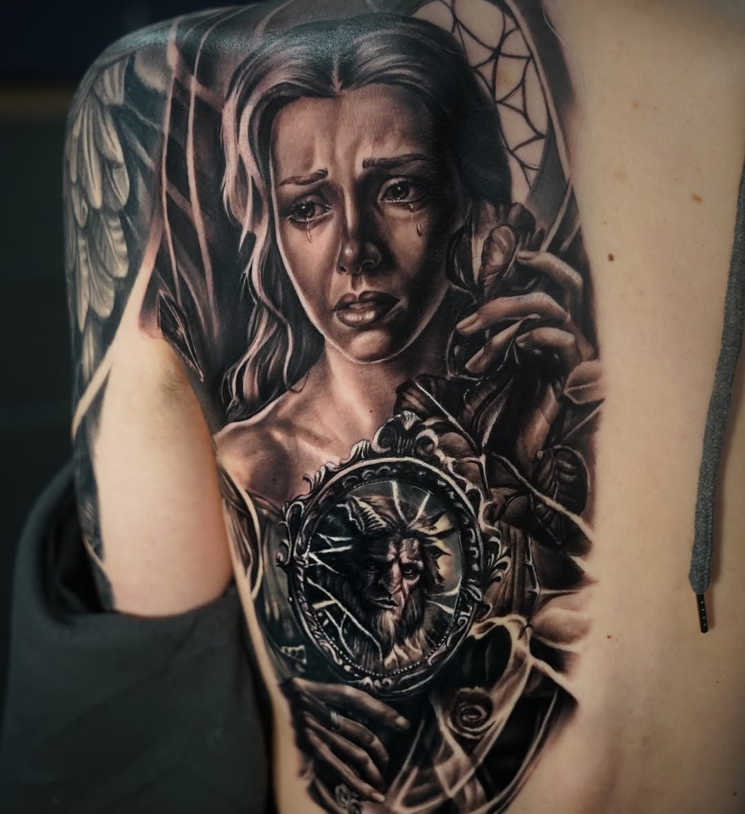 Woman and beast in mirror realism tattoo on the shoulder by ๐๐๐