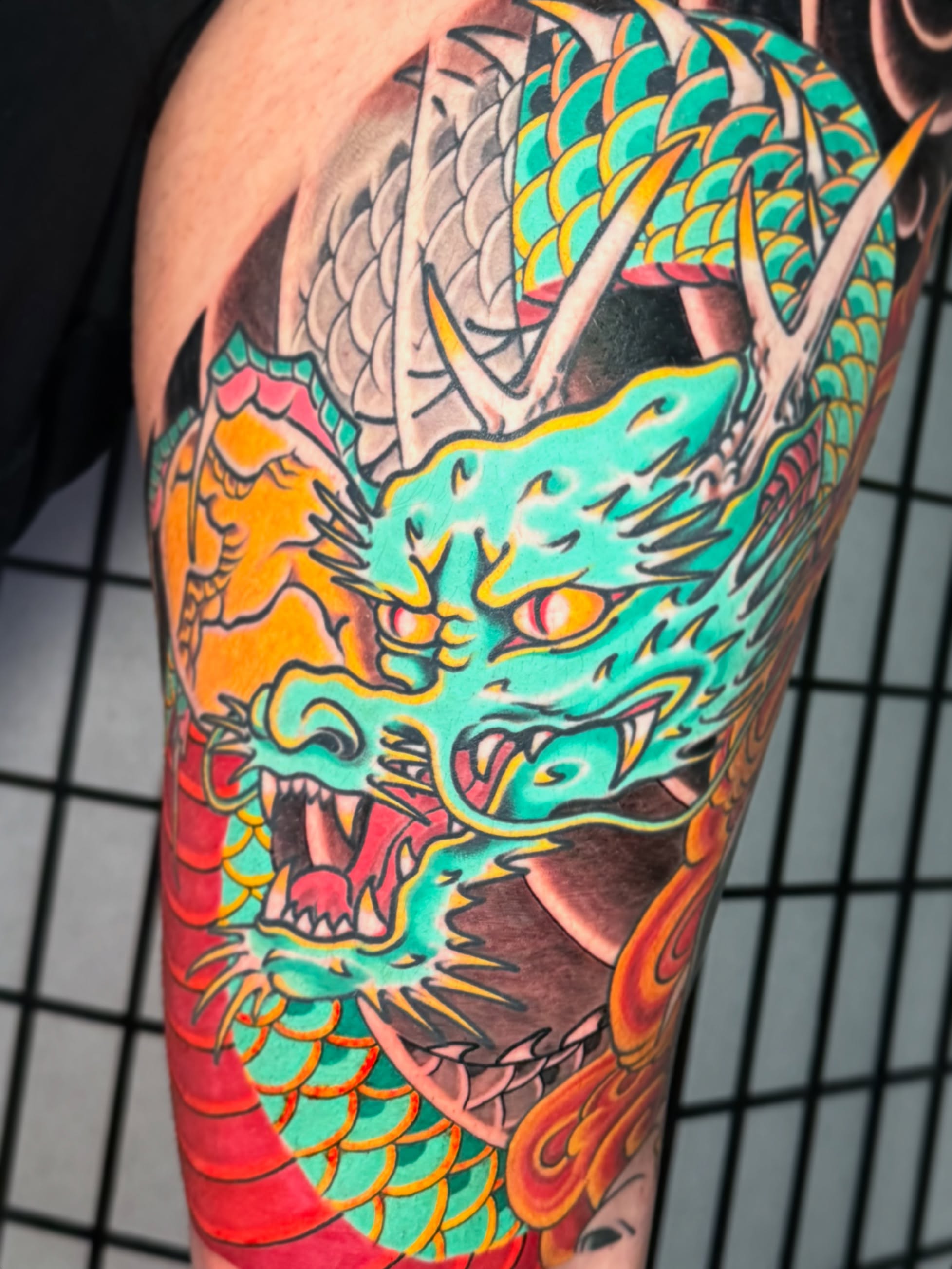 Dragon japanese irezumi tattoo on the thigh by Mario Arcila