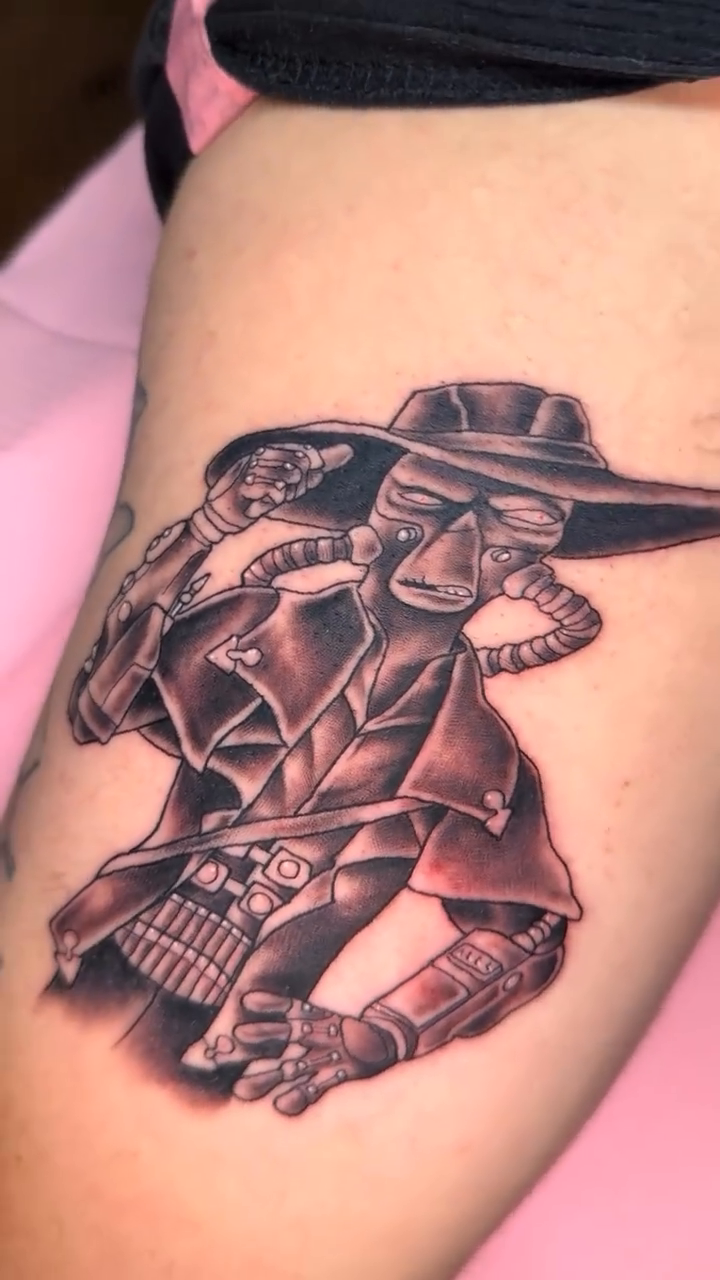 Plague Doctor with steampunk elements tattoo on the upper arm by Erin Peterson