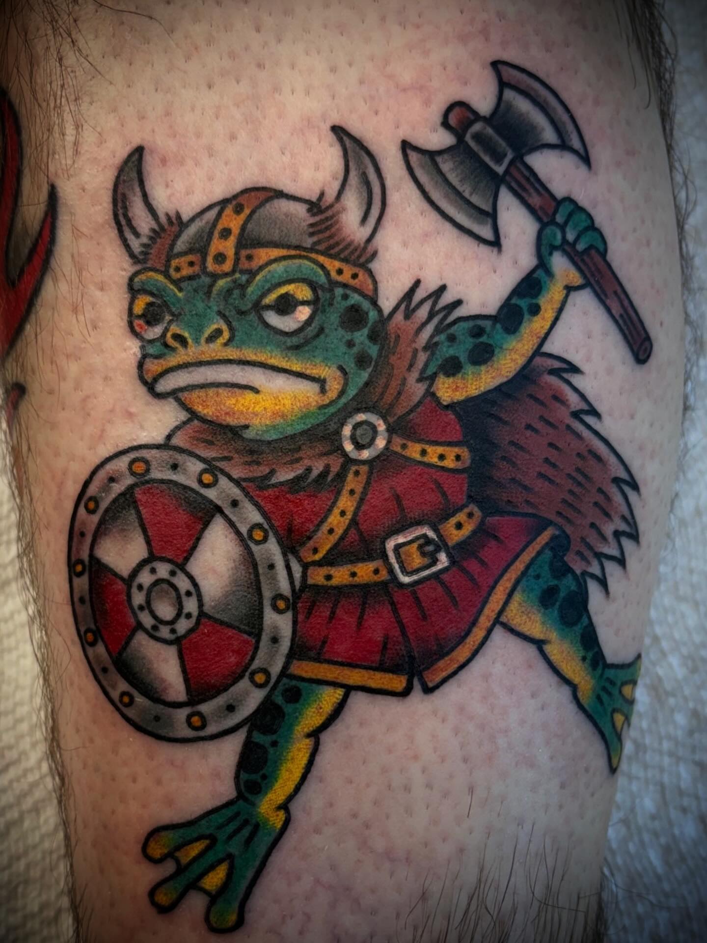 Frog viking warrior American traditional tattoo on the thigh by Gardner, Gardner, Massachusetts