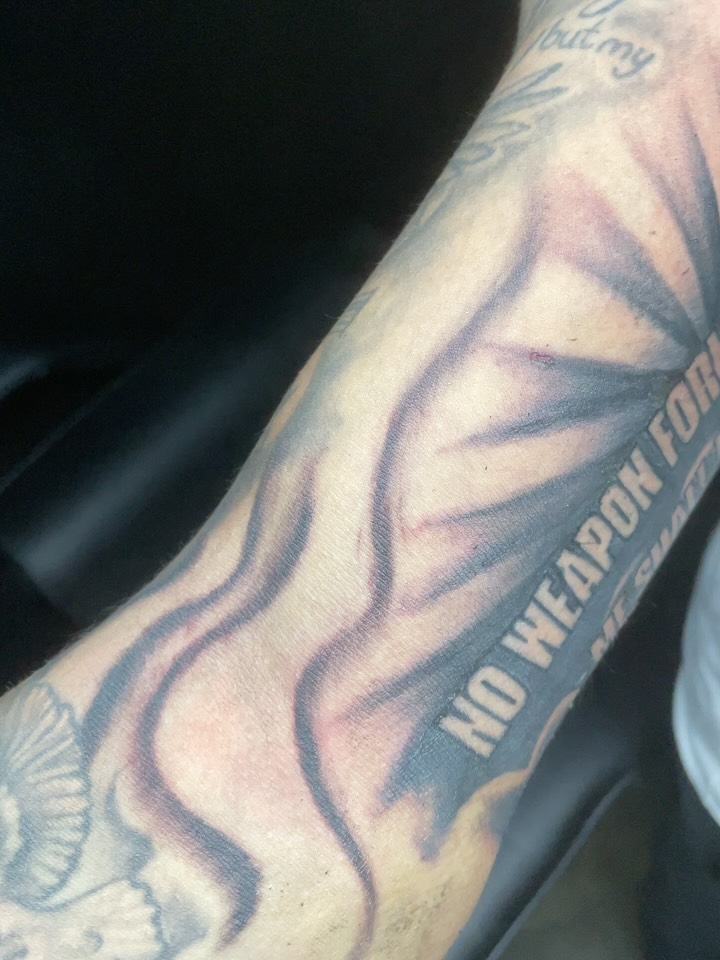 Flame black and grey tattoo on the forearm by TreCashTats💉🩸 MisfitzTattooStudio