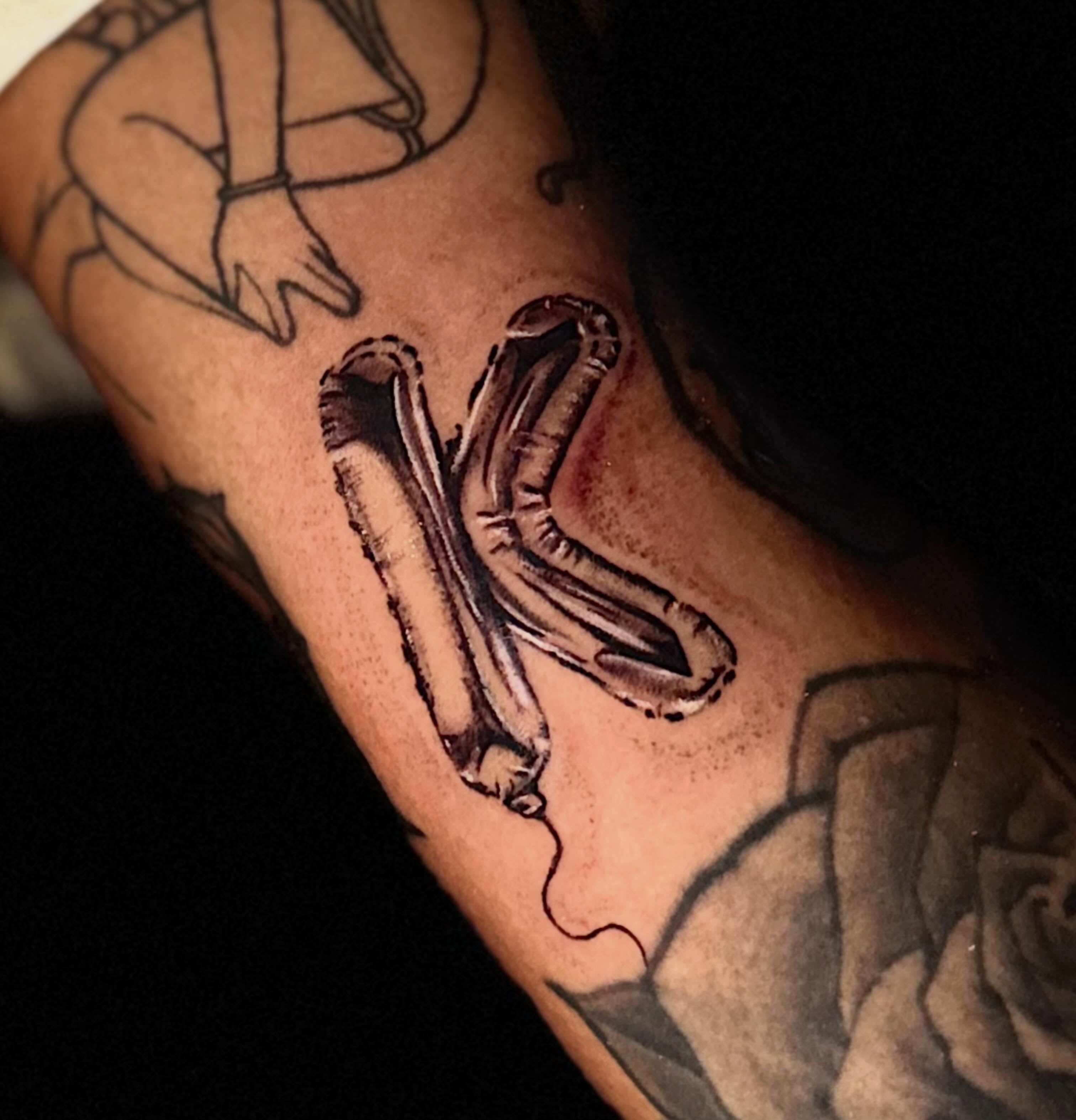 Balloon black and grey tattoo on the forearm by Giana Martinez, Wichita, Kansas