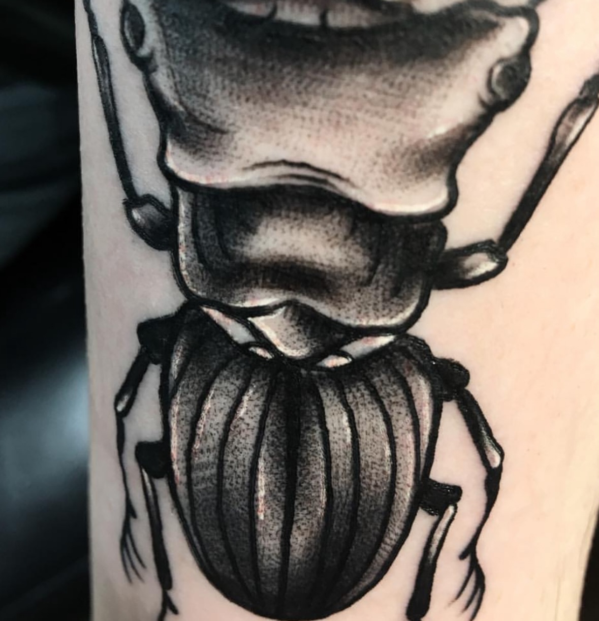 Scarab beetle black and grey tattoo on the forearm by Brandon Harrison, Kansas City, Missouri