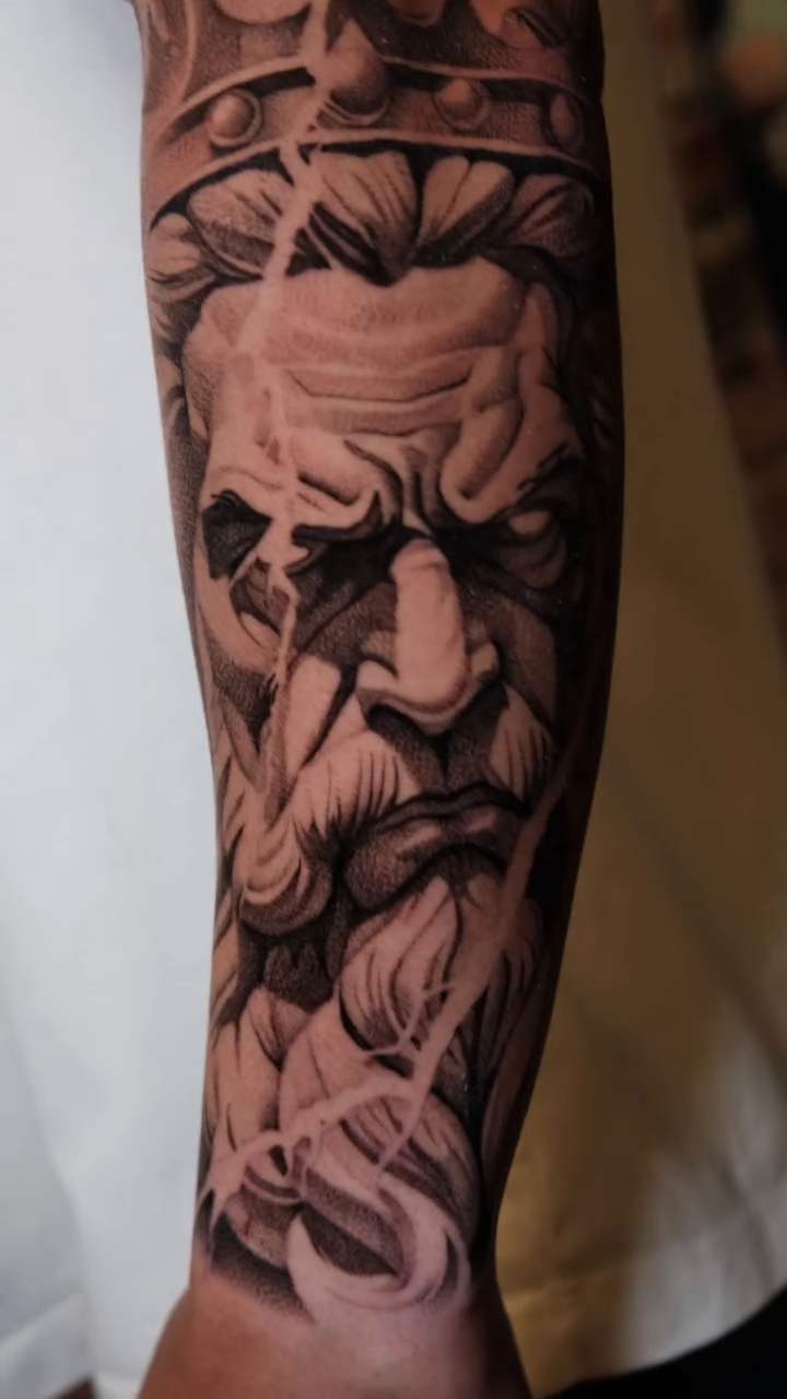 Surrealism tattoo on the forearm by Ana Fajardo