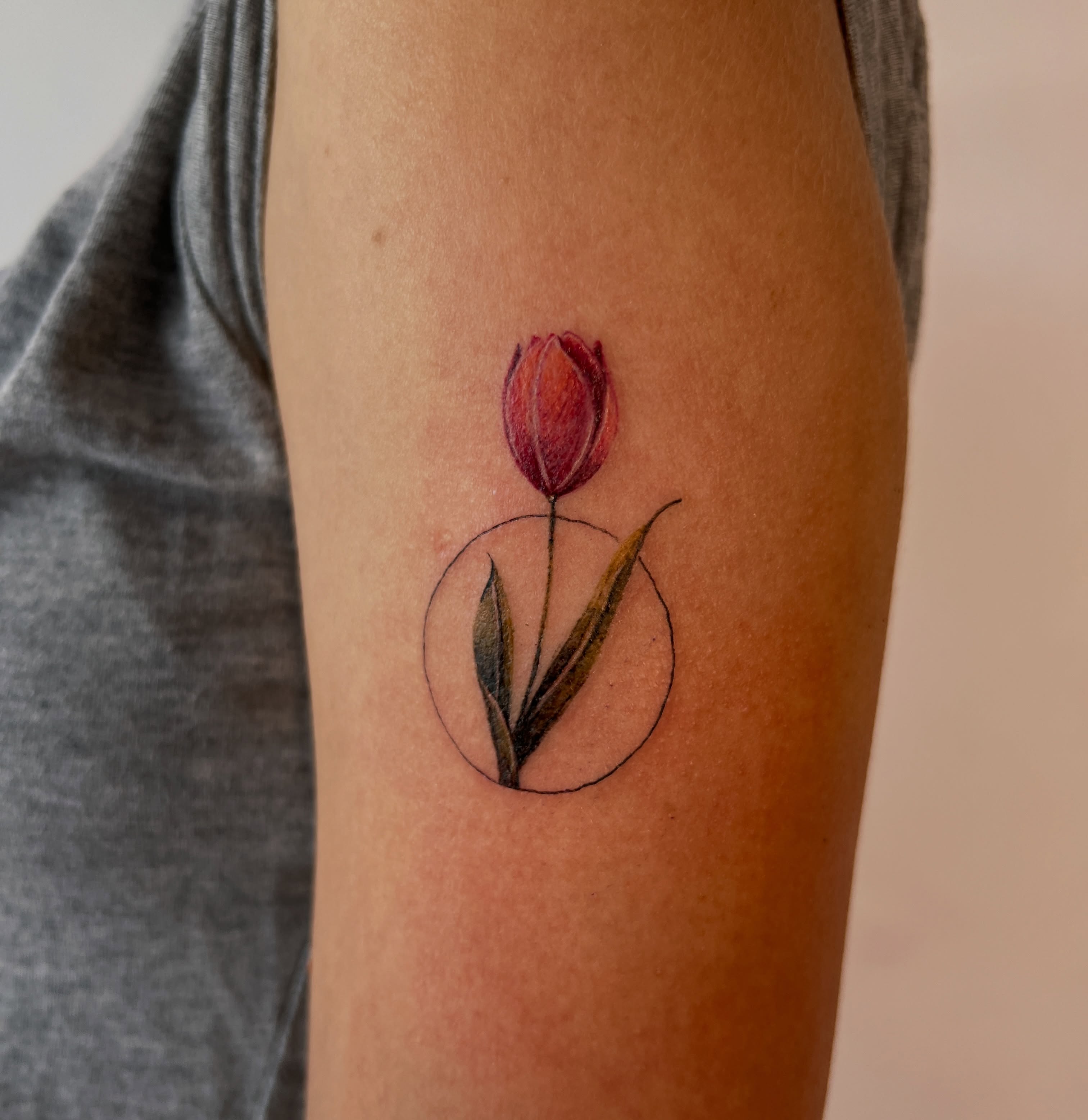 Tulip realism tattoo on the forearm by Eleana, North Miami, Florida