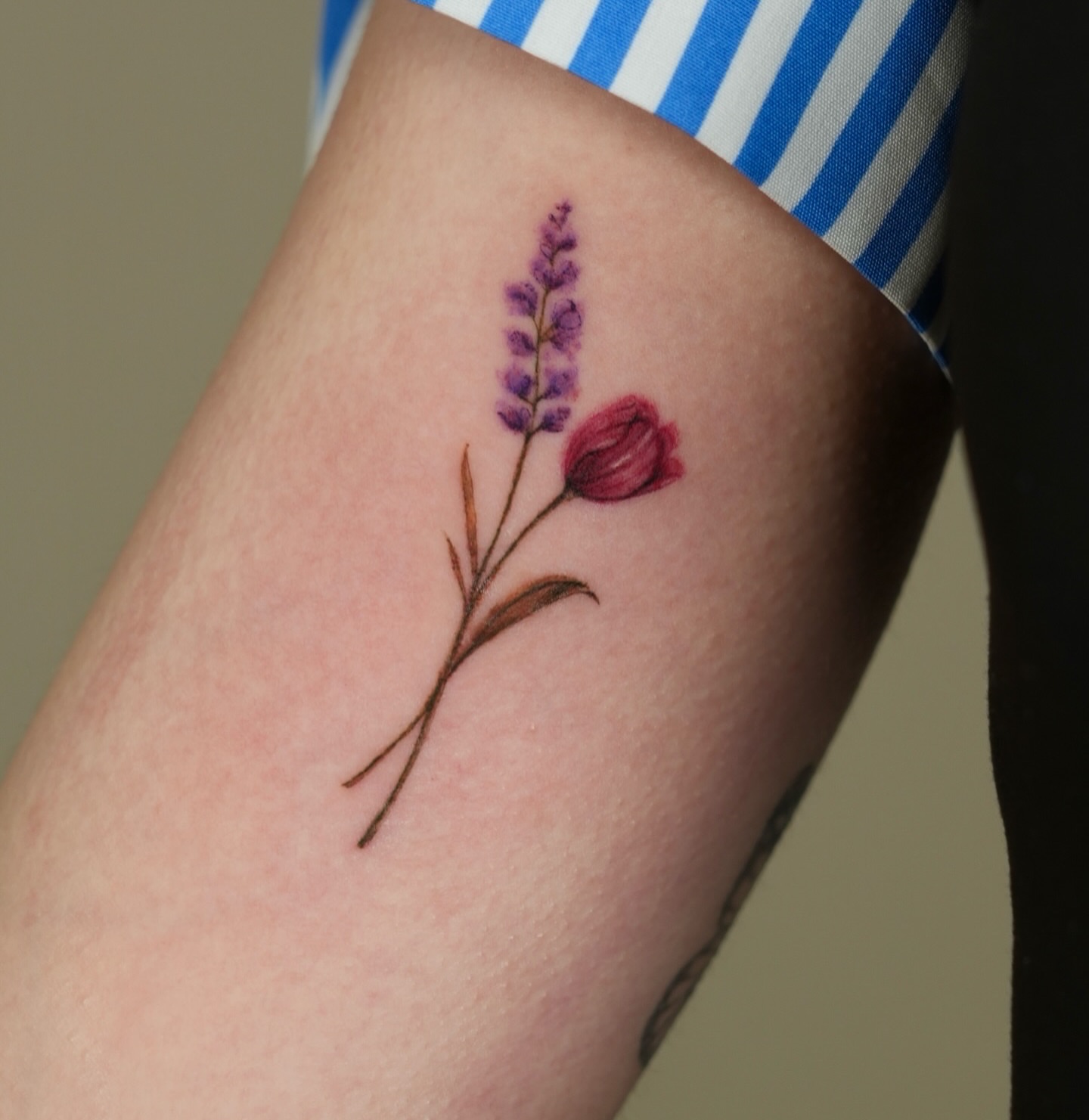 Lavender and tulip realism tattoo on the forearm by Eleana, North Miami, Florida