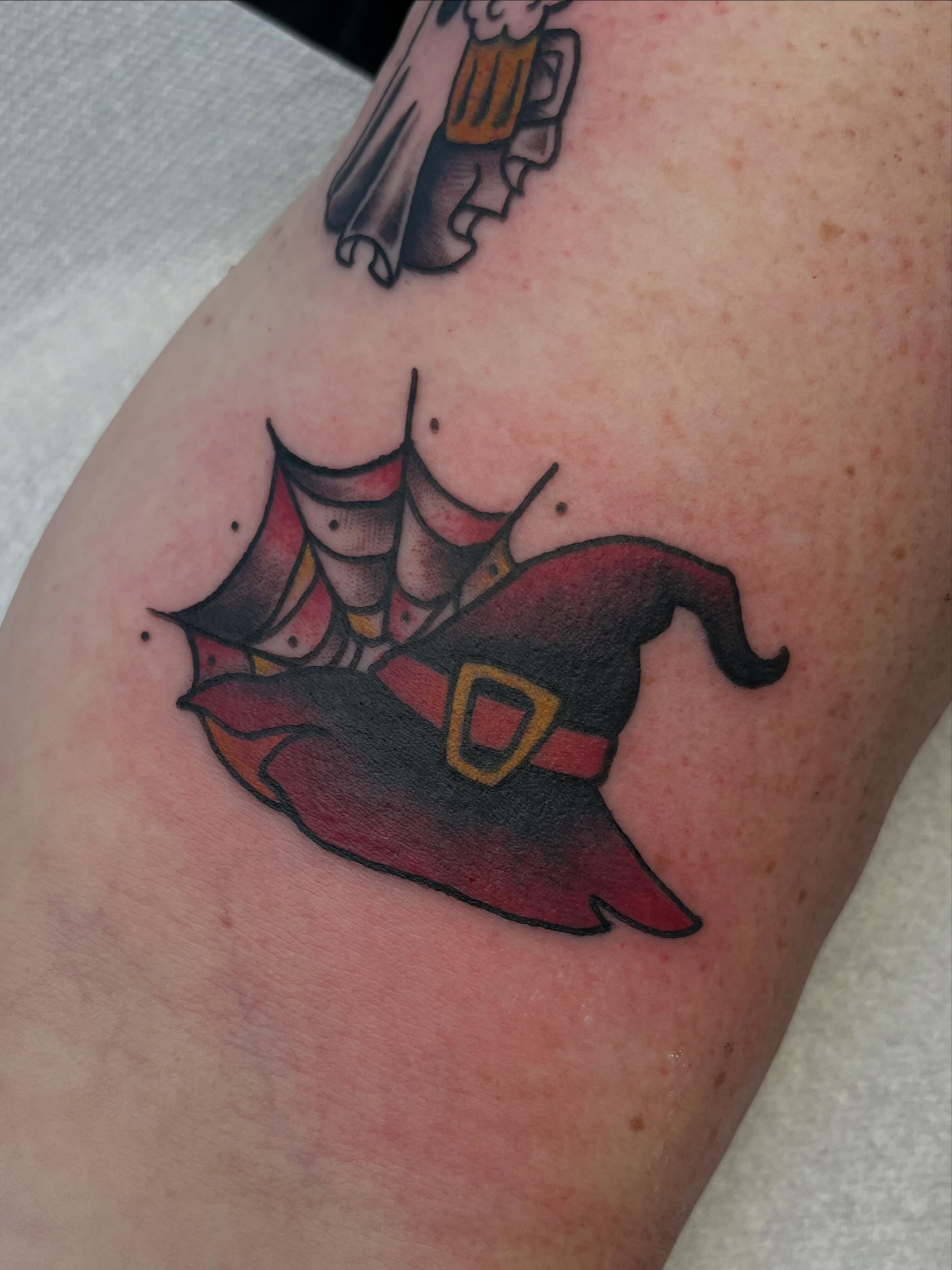 Witch hat American traditional tattoo on the forearm by Danielle Lorandeau
