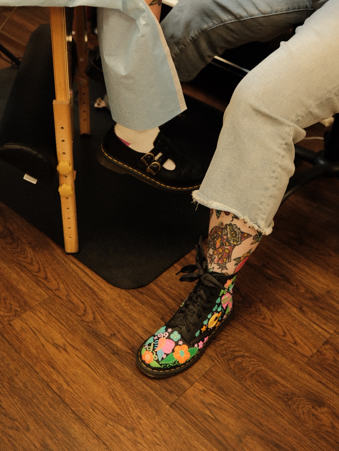 Floral design new school tattoo on the foot by Sierra Mack