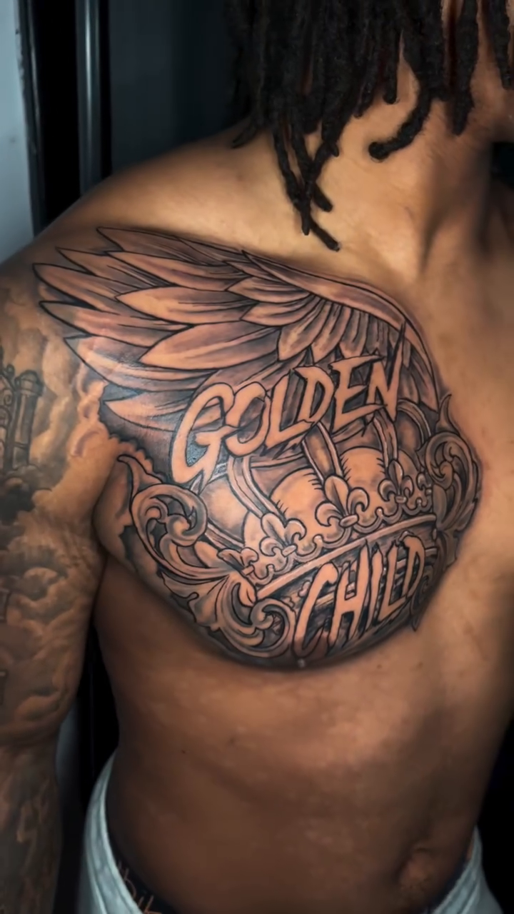 Chest piece with wings and crown Chicano tattoo on the back by Jakobi
