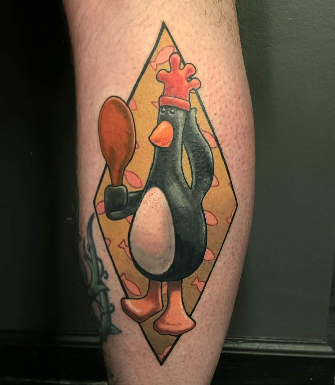 Chicken illustrative tattoo on the forearm by Gina Carlson