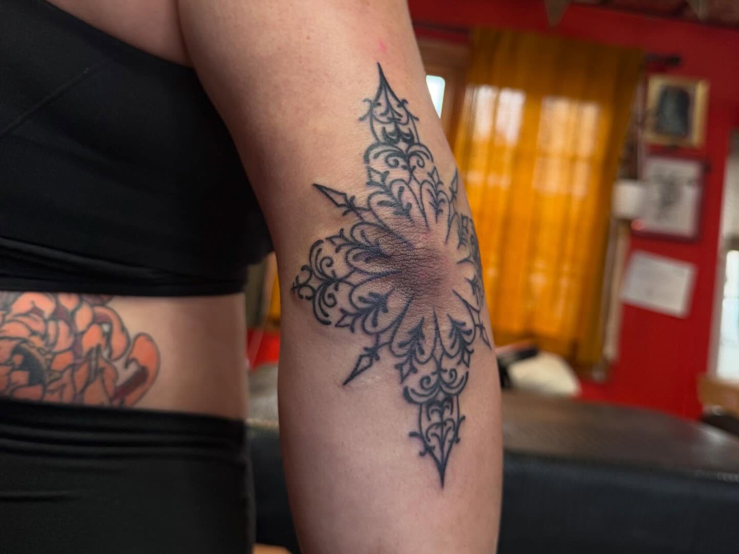 Floral mandala ornamental tattoo on the forearm by Jacqui Rose