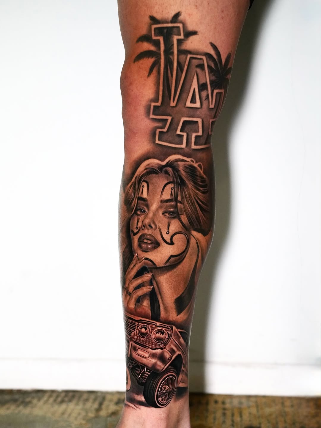 Chicano tattoo on the forearm by Luis Peña