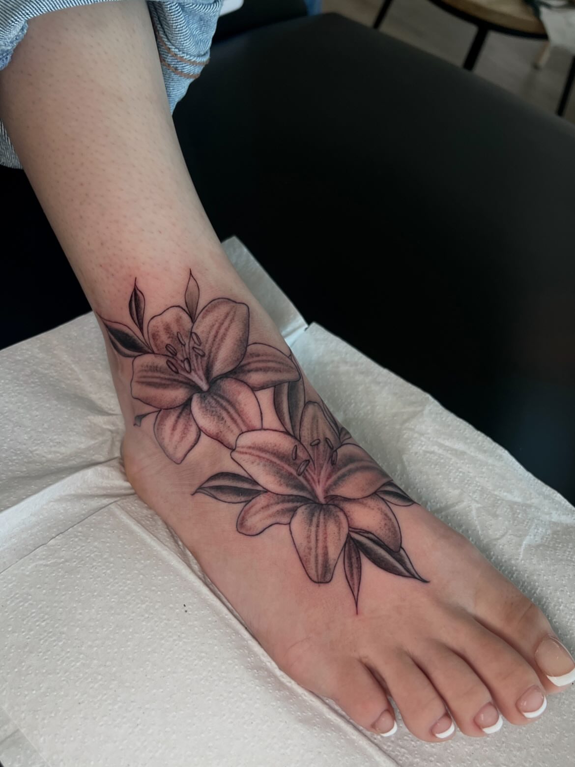 Lilies black and grey tattoo on the foot by ππππππ ππππππ - ππππ‘ππ₯ ππ¨π₯π’πππ«π’π¨π¬ π΅π