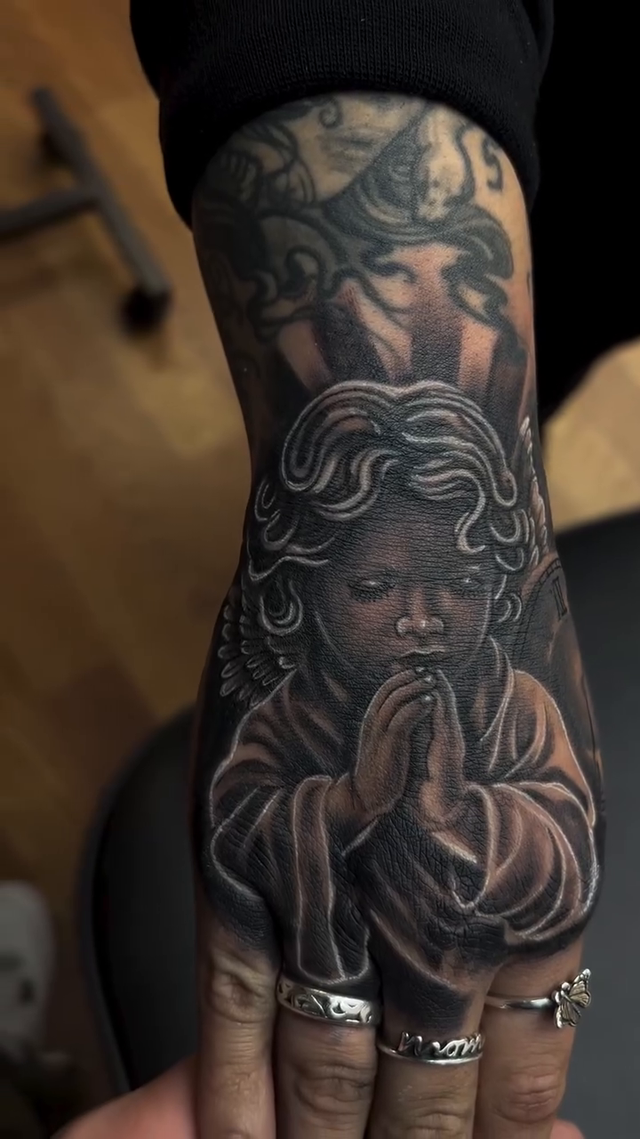 Child angel praying realism tattoo by Thomas