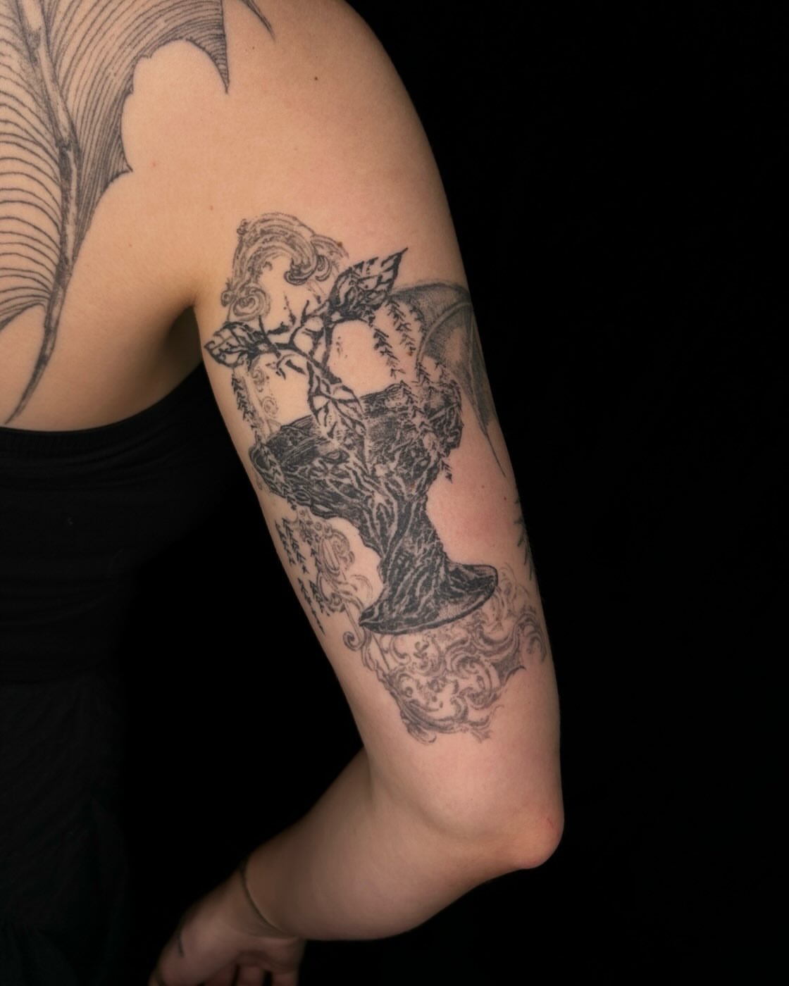 Angel with wings black and grey tattoo on the forearm by ๐๐ฆ๐ฐ๐ฆ๐