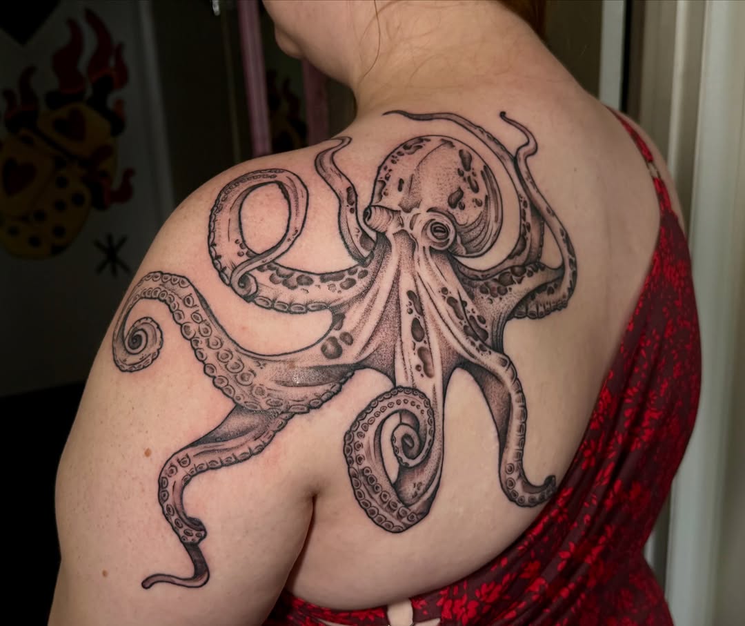 Octopus fine line tattoo on the shoulder by Sophia, New Carlisle, Ohio